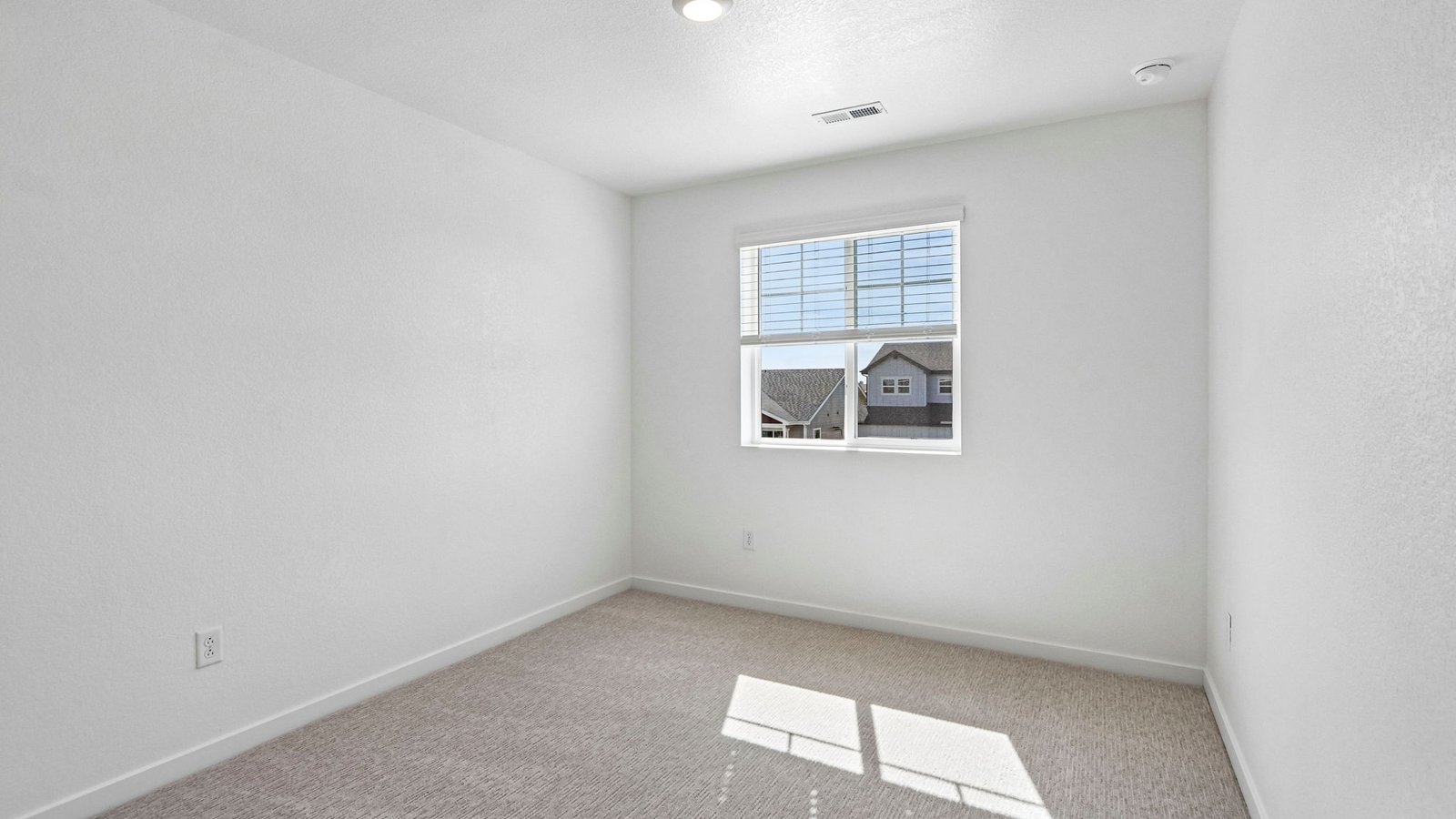 Guest bedroom in new D.R. Horton home