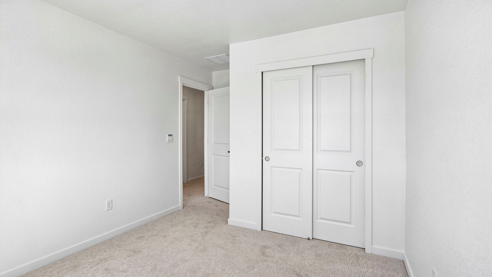Guest bedroom in new D.R. Horton home
