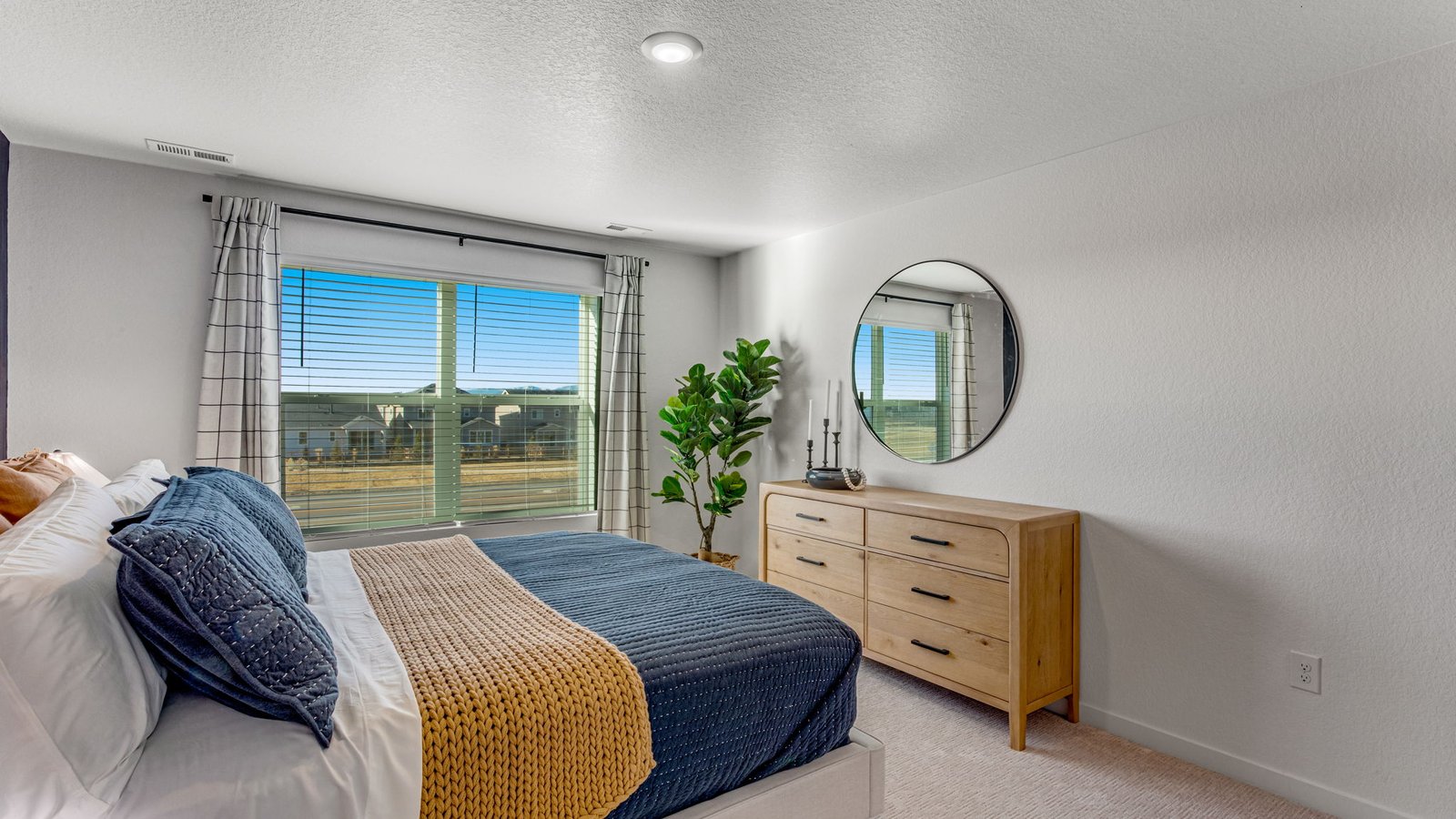 updated primary bedroom in new home