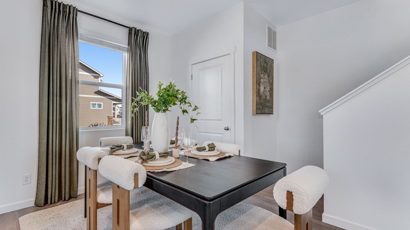 Bright dining area with easy access to the oversized kitchen island and great room.