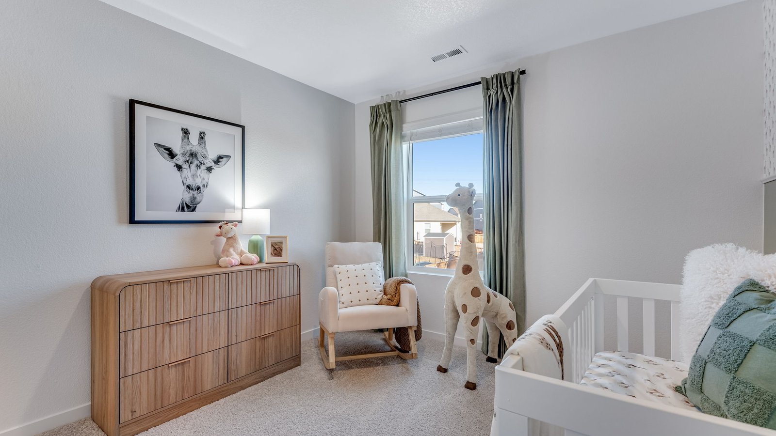Comfortable upstairs bedroom with natural light and versatile living space.