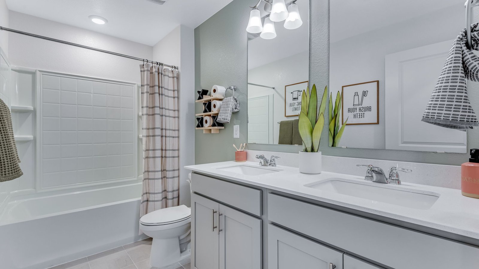 Full secondary bathroom with modern finishes serving the upstairs bedrooms.