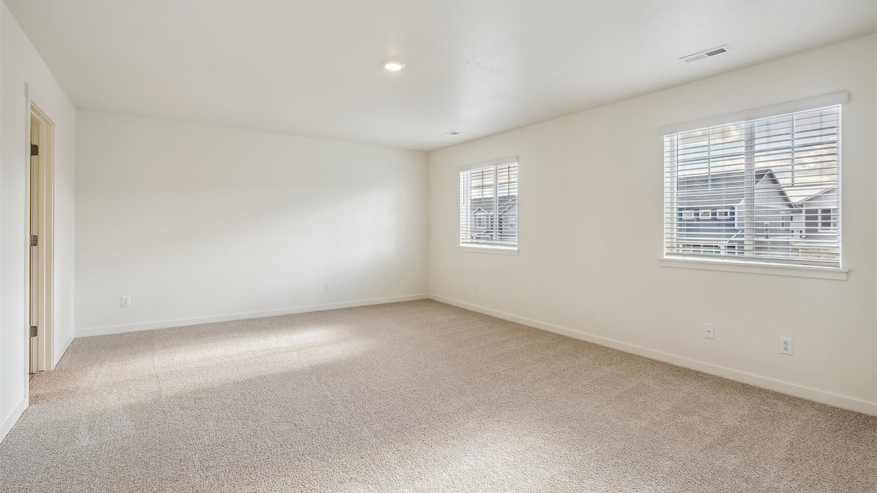 large primary bedroom in new home
