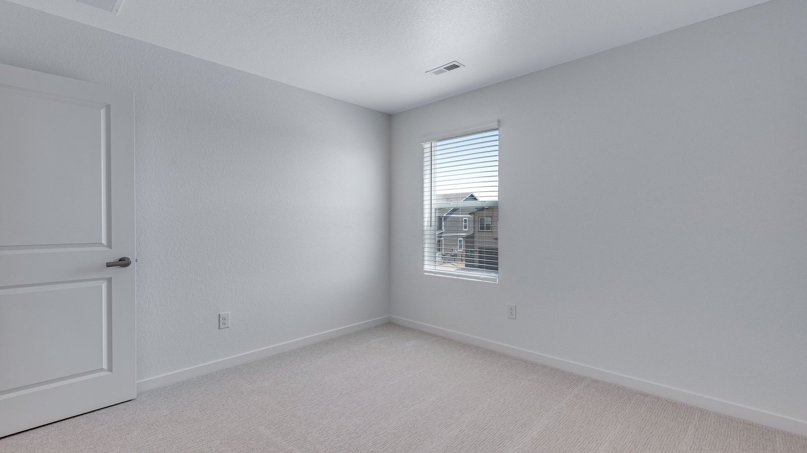 Comfortable bedroom designed for family members or overnight guests.