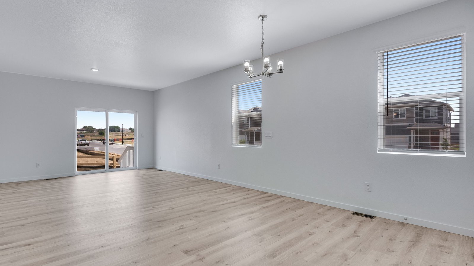 Spacious family room with abundant natural light and seamless connection to the kitchen.