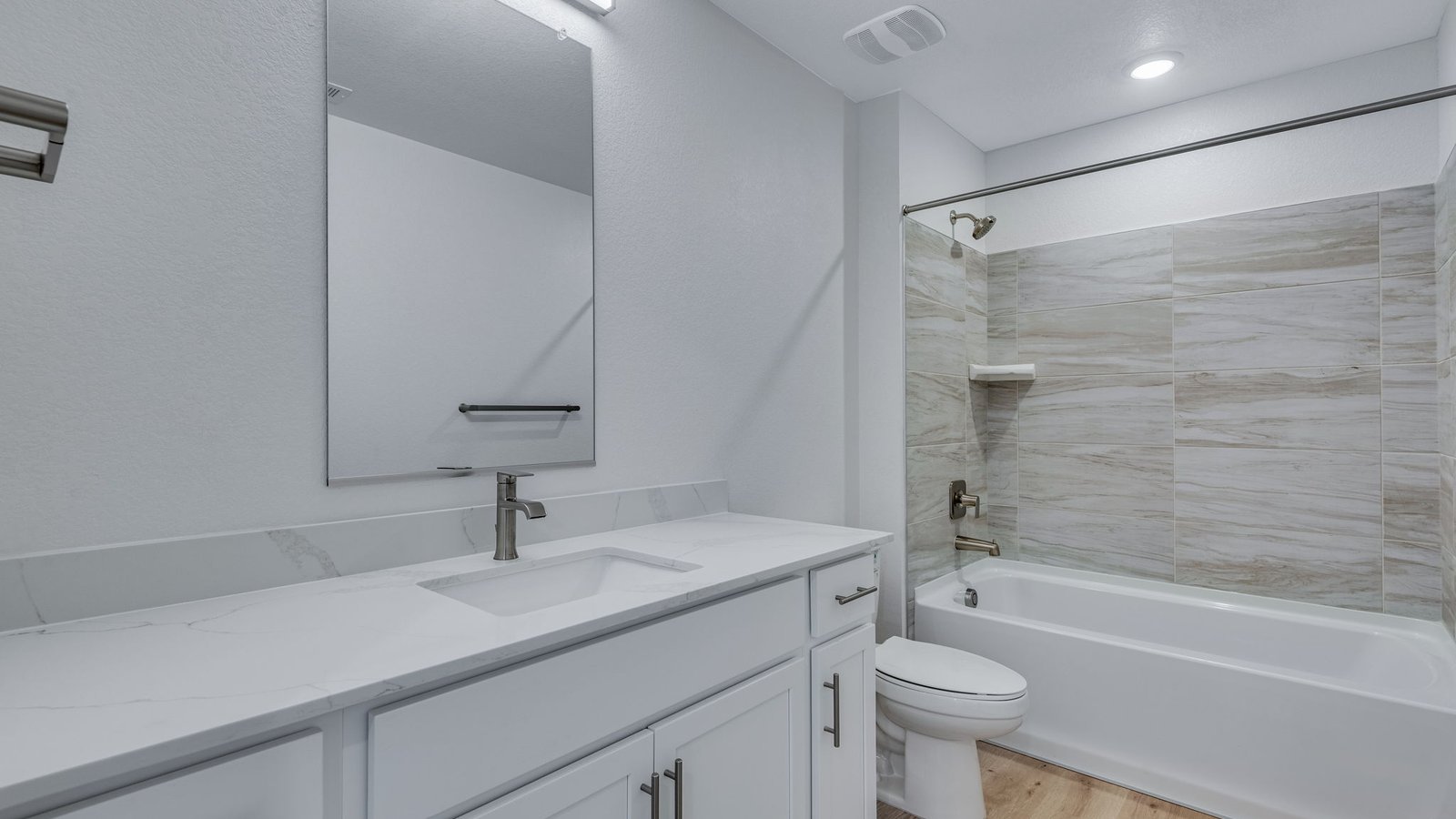 Conveniently located bathroom with modern fixtures and functional design.