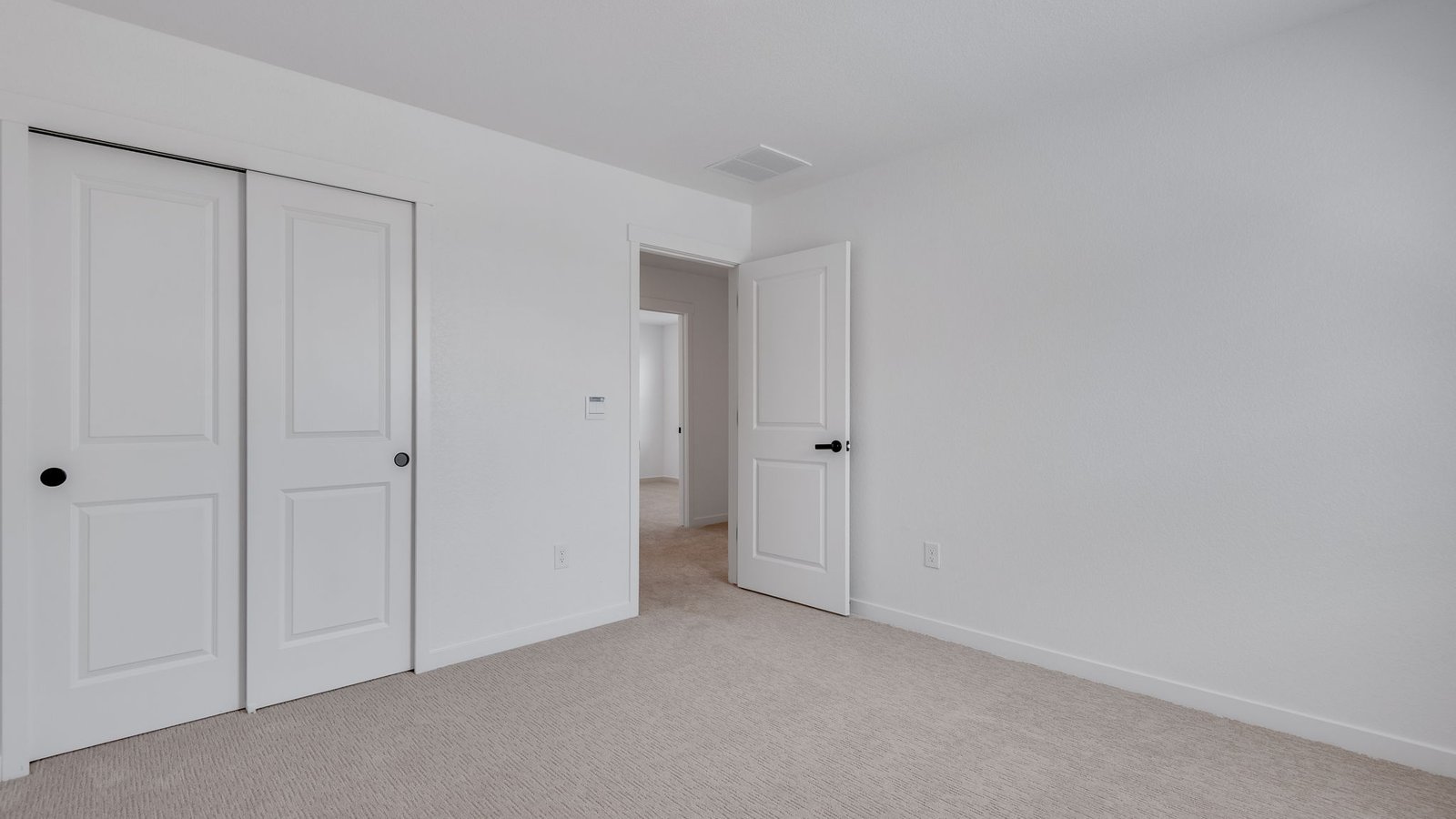 Spacious upstairs bedroom in the Elm floor plan at Prairie Song.