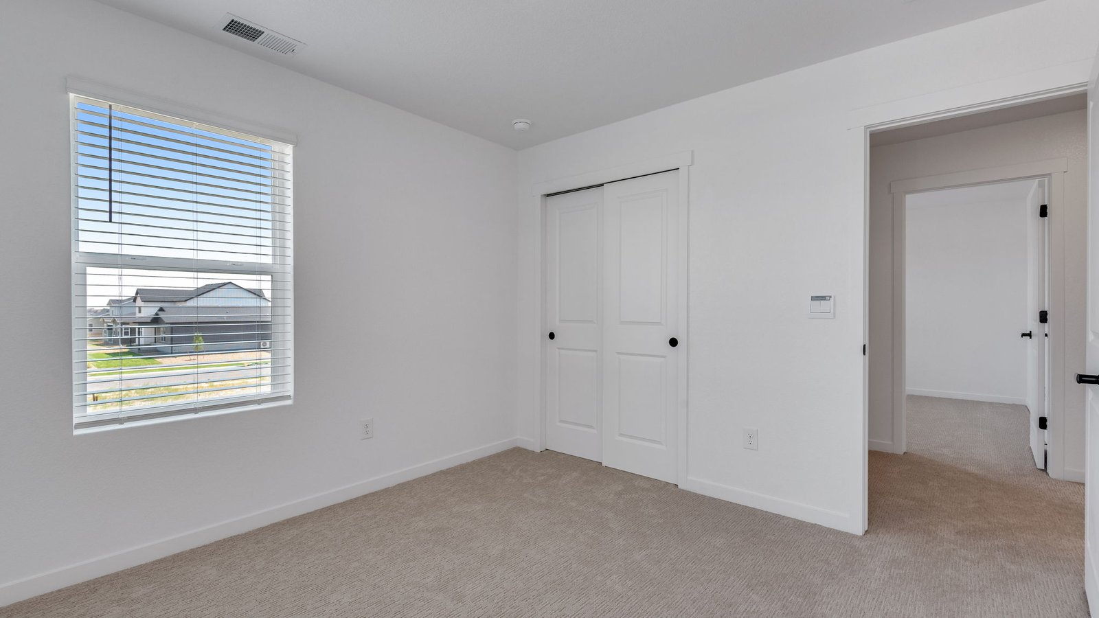Guest bedroom in new D.R. Horton home