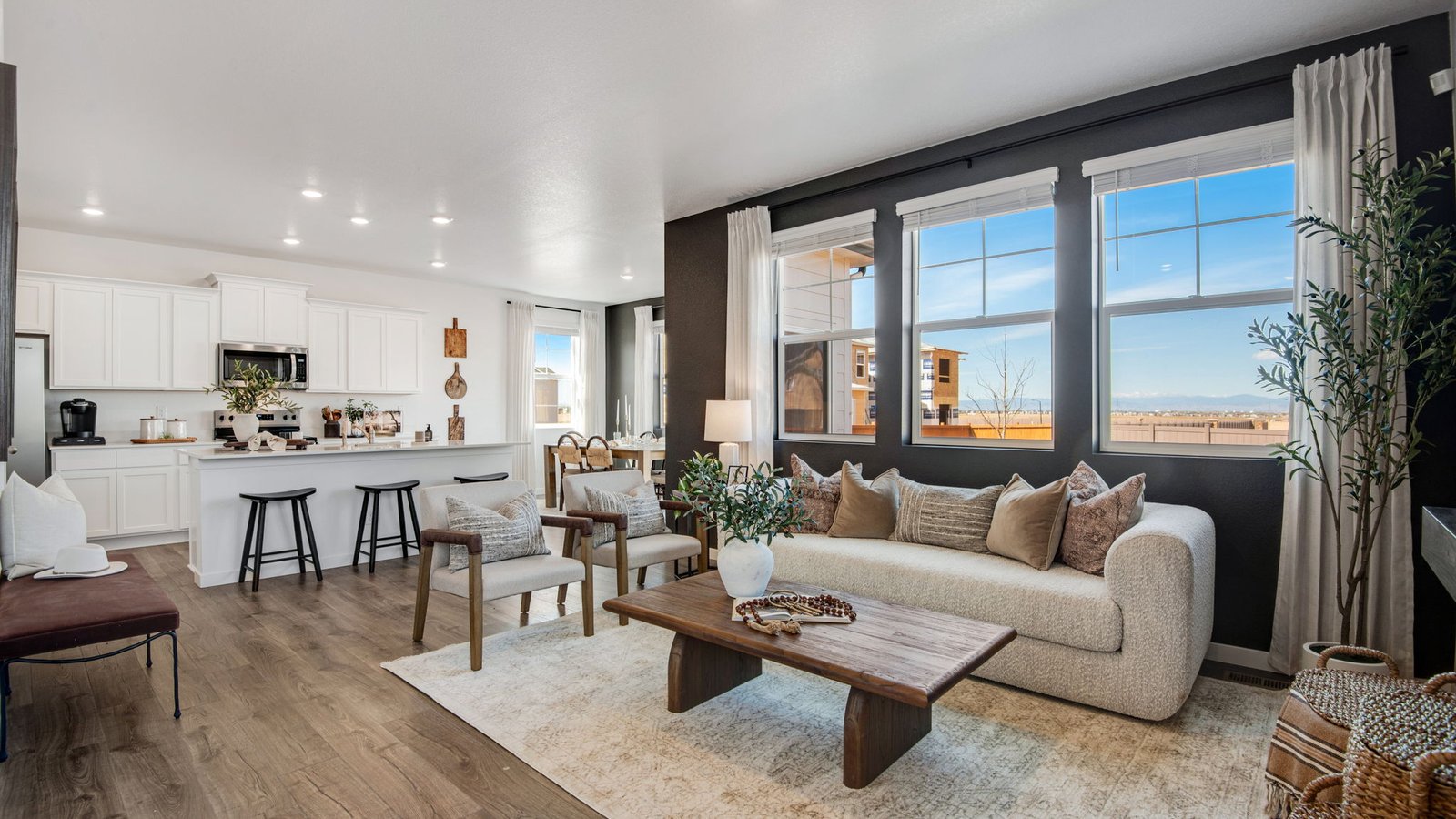 Spacious living area featuring an open layout and abundant natural light.
