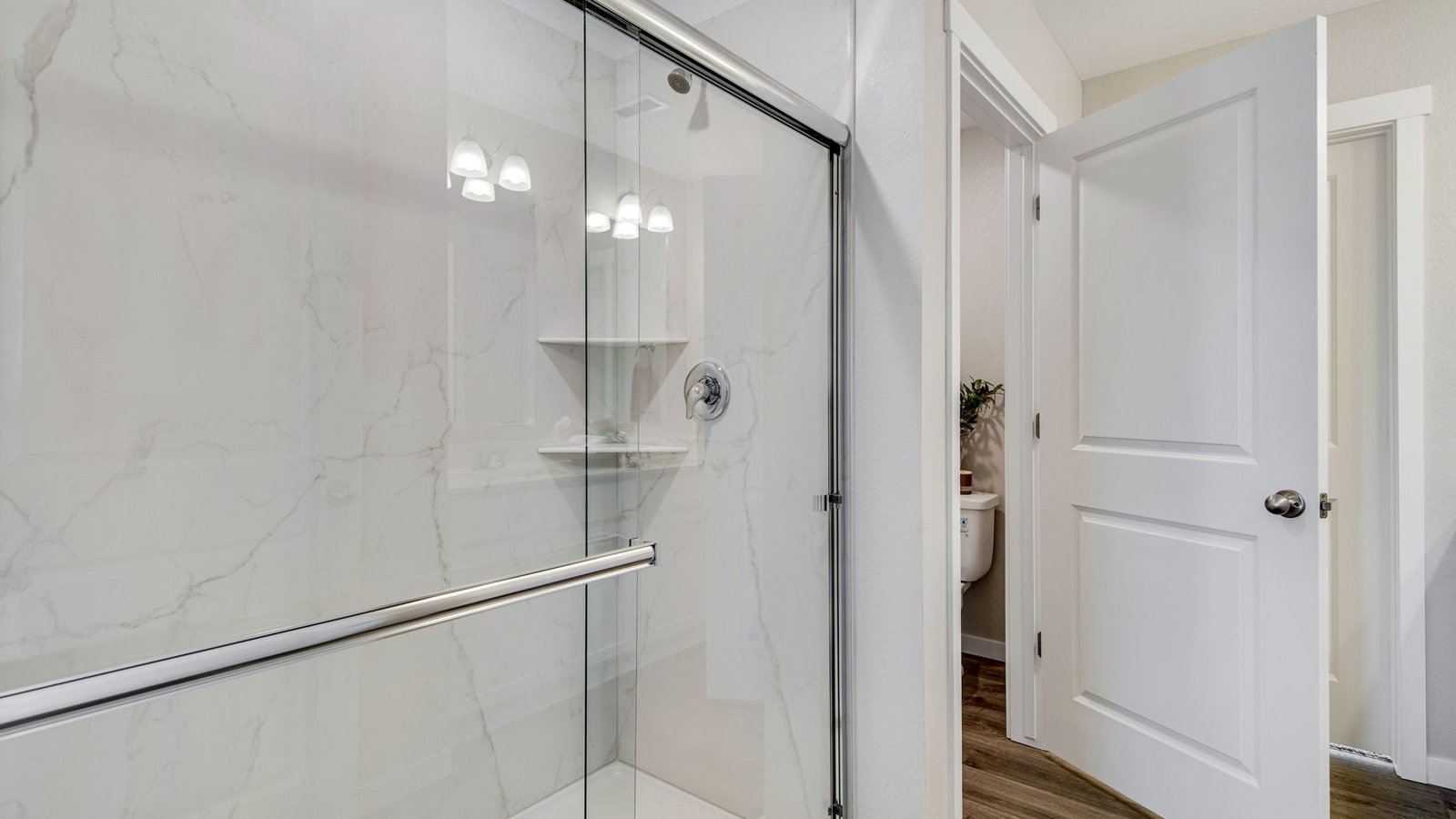 Bright primary bath offering ample counter space and functionality.