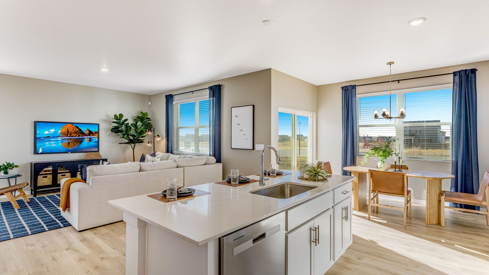 Bright kitchen with contemporary cabinetry, stainless steel appliances, and spacious workspace.