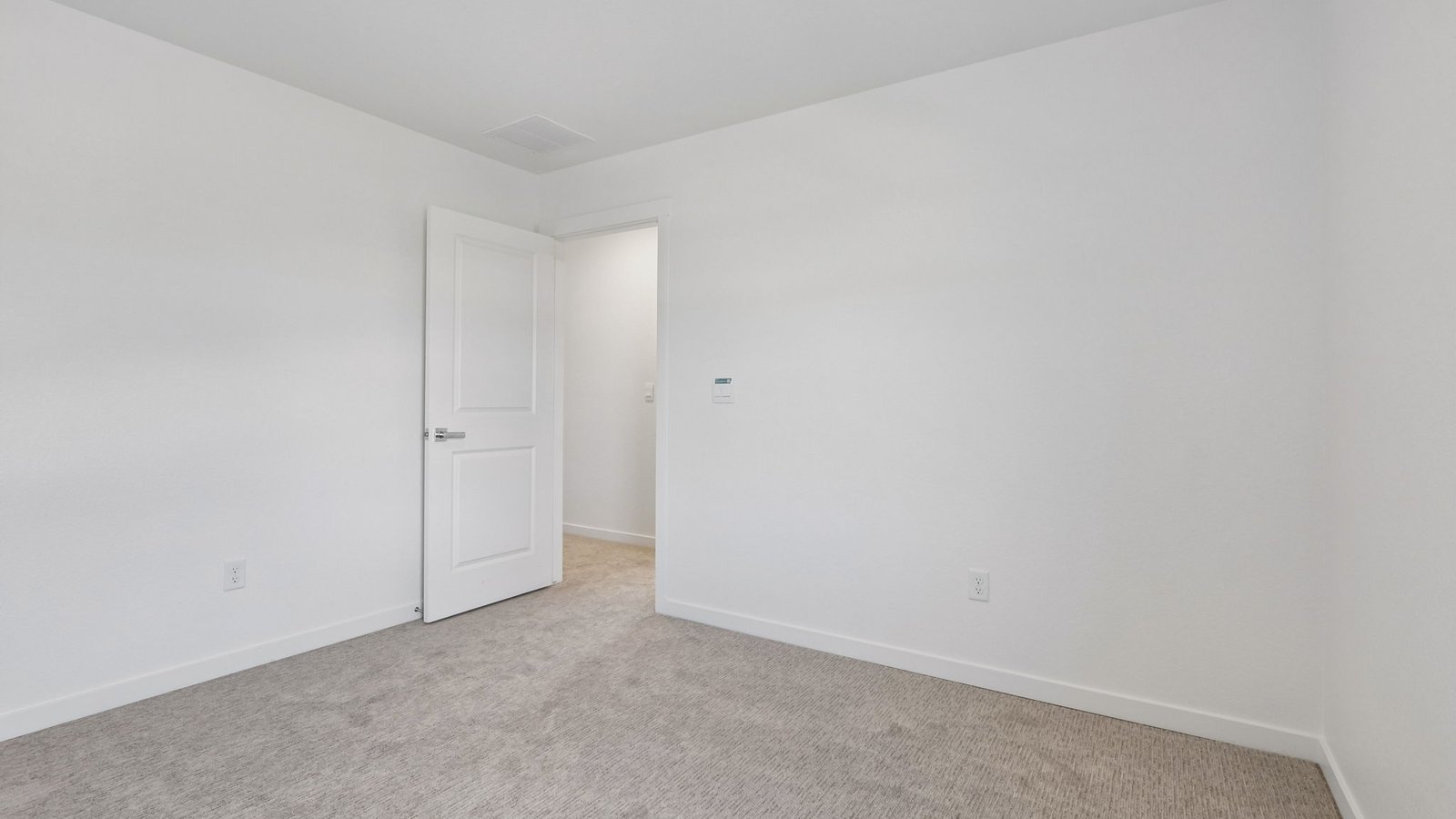 Secondary bedroom designed for comfort and functionality.