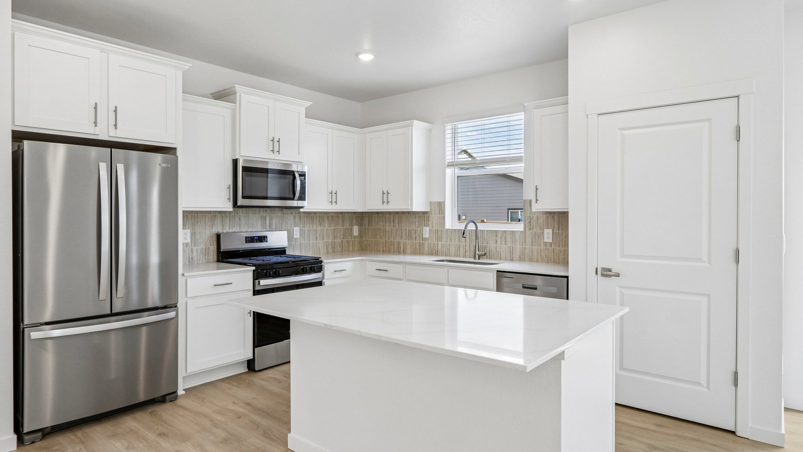 Spacious kitchen in new home in Granary community