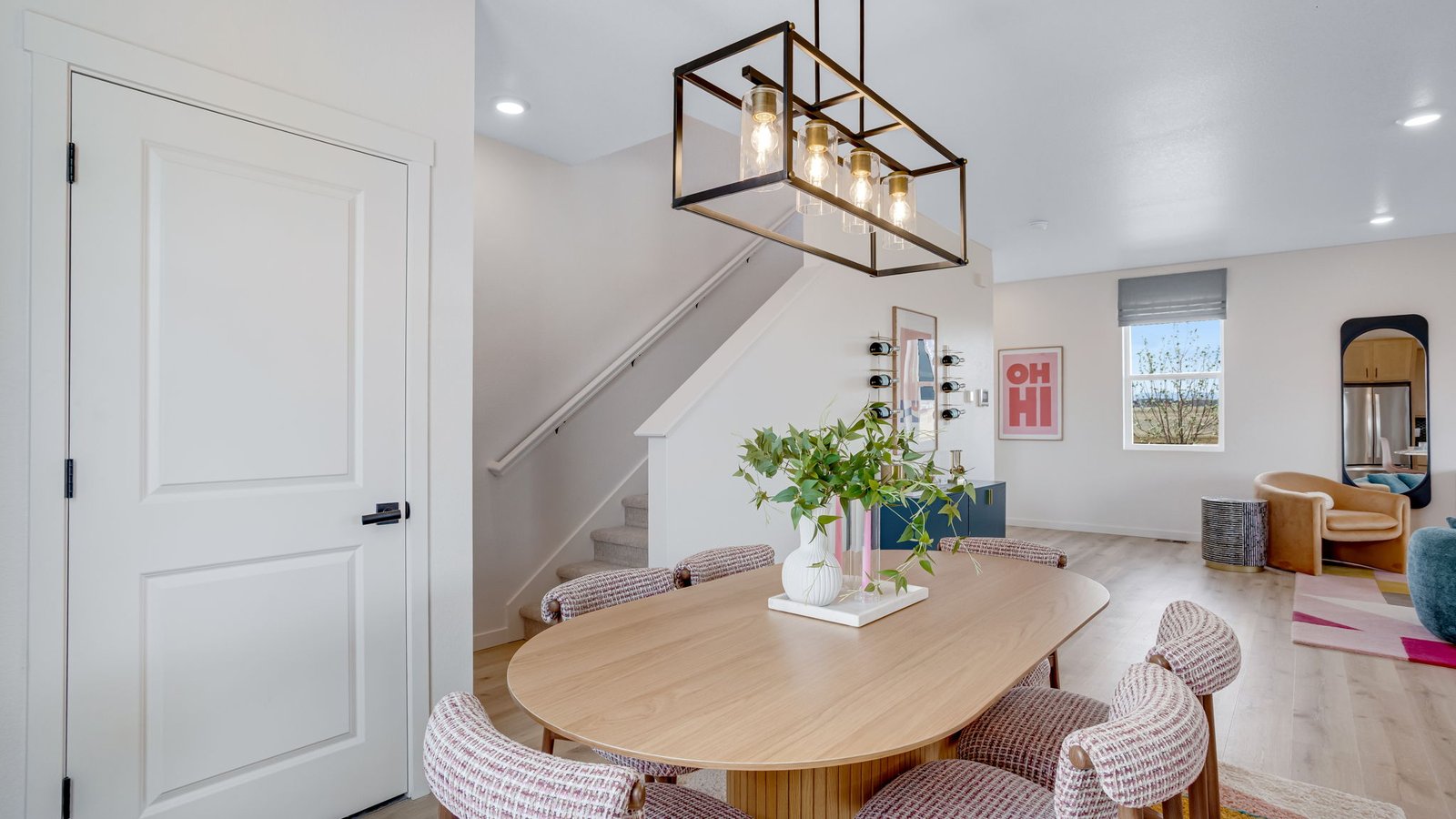 Dedicated dining area conveniently located between the kitchen and living room.