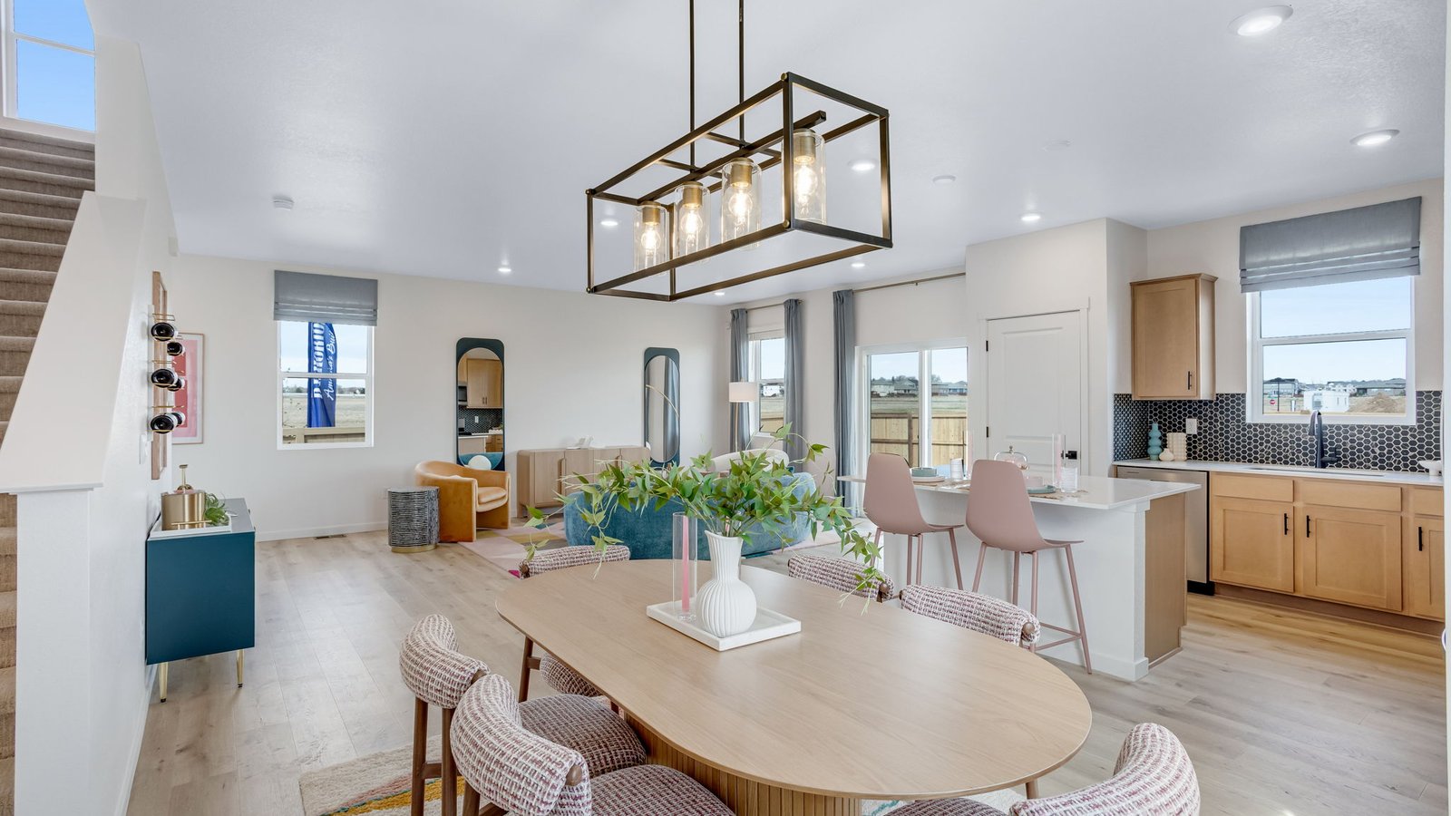 Dining space with open layout designed for everyday meals in a new Granary home in Johnstown, Colorado.