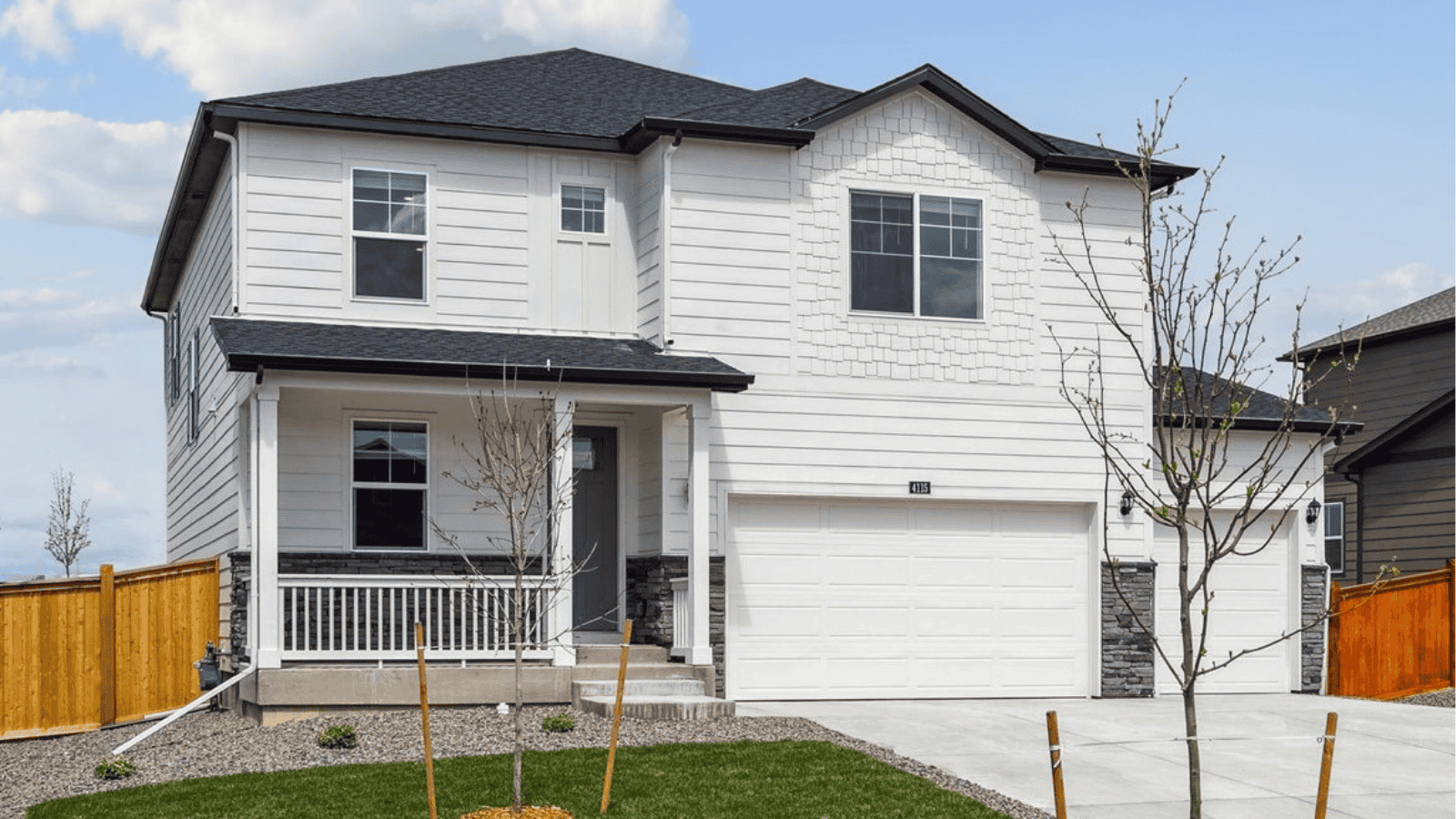 Exterior of two story home available in D.R. Horton Brighton Crossing community Brighton, CO