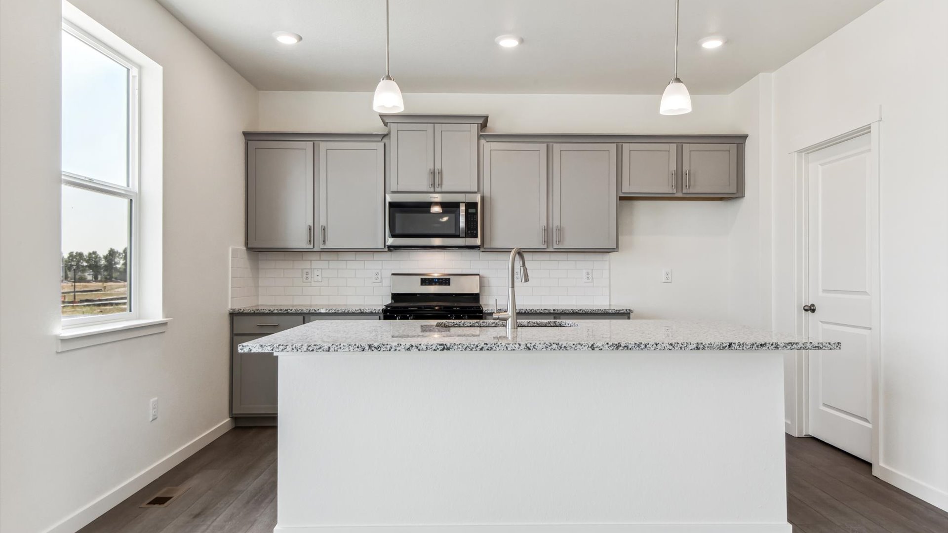 Large kitchen island in new modern kitchen
