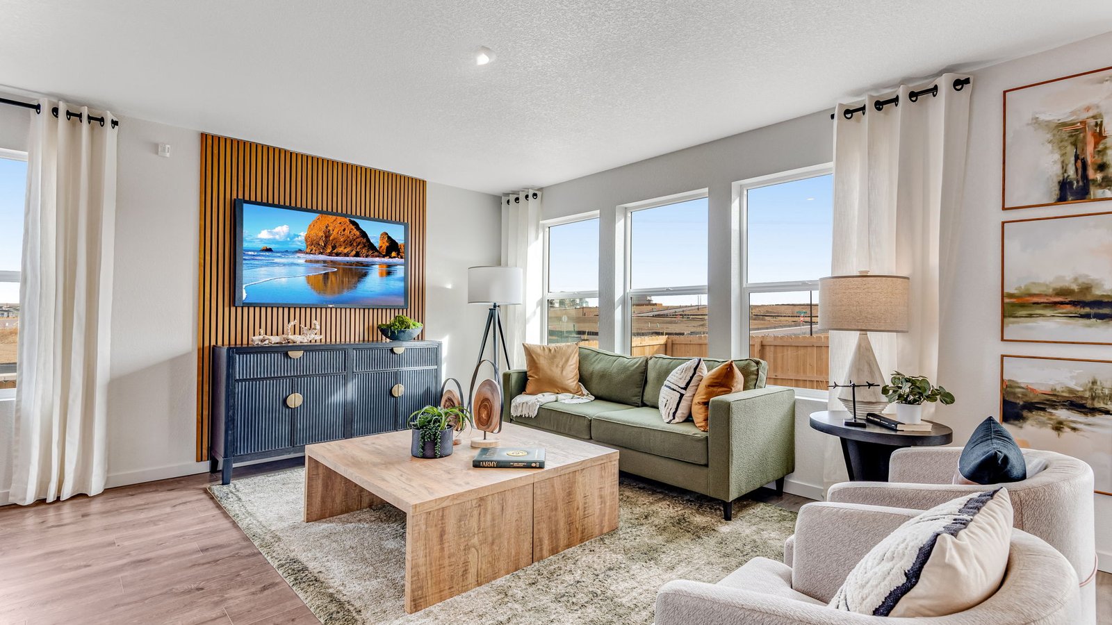 living room with large windows in D.R. Horton new construction home near brighton colorado