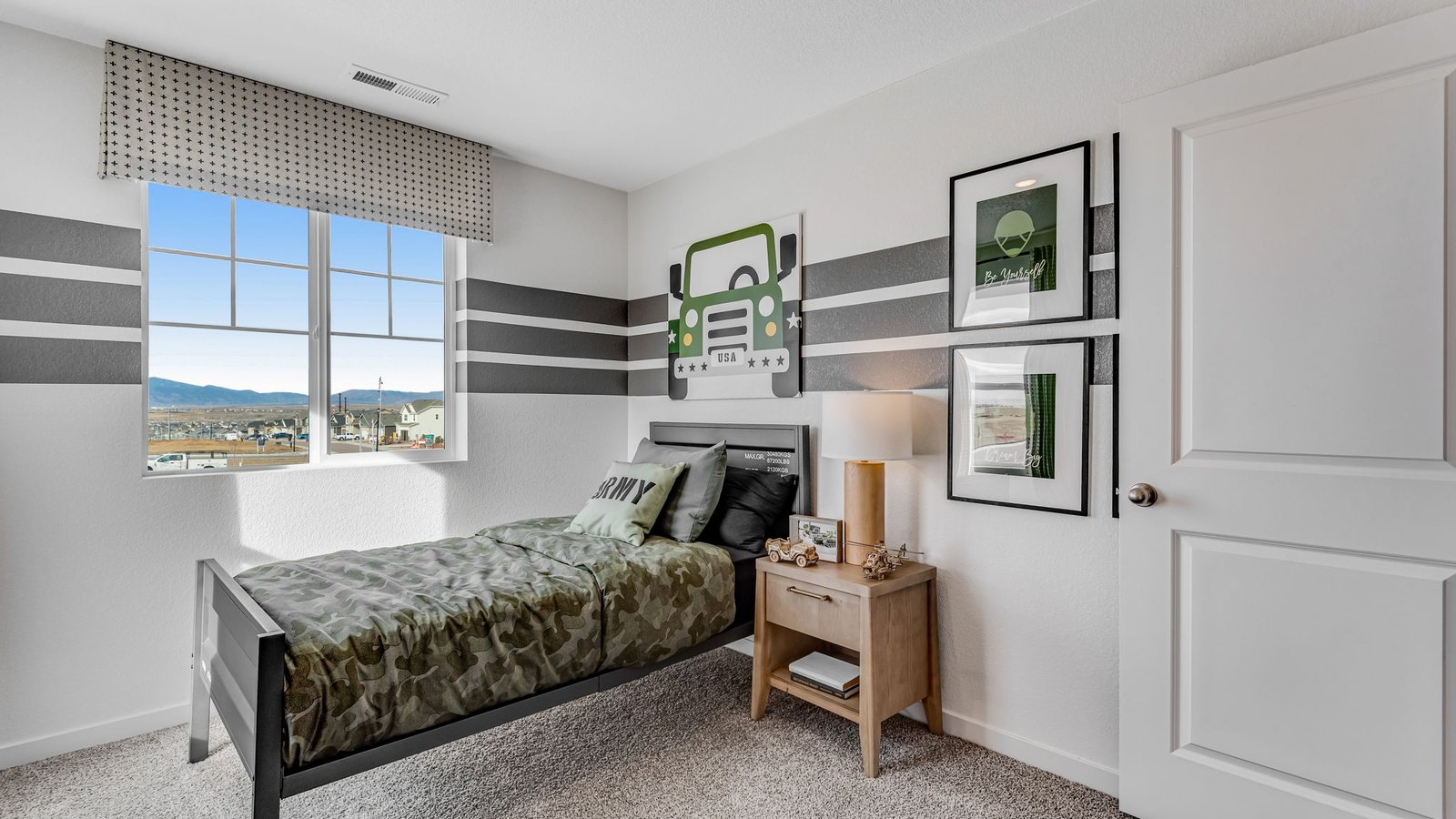 bedroom with walk-in closet in D.R. Horton new construction home near brighton colorado