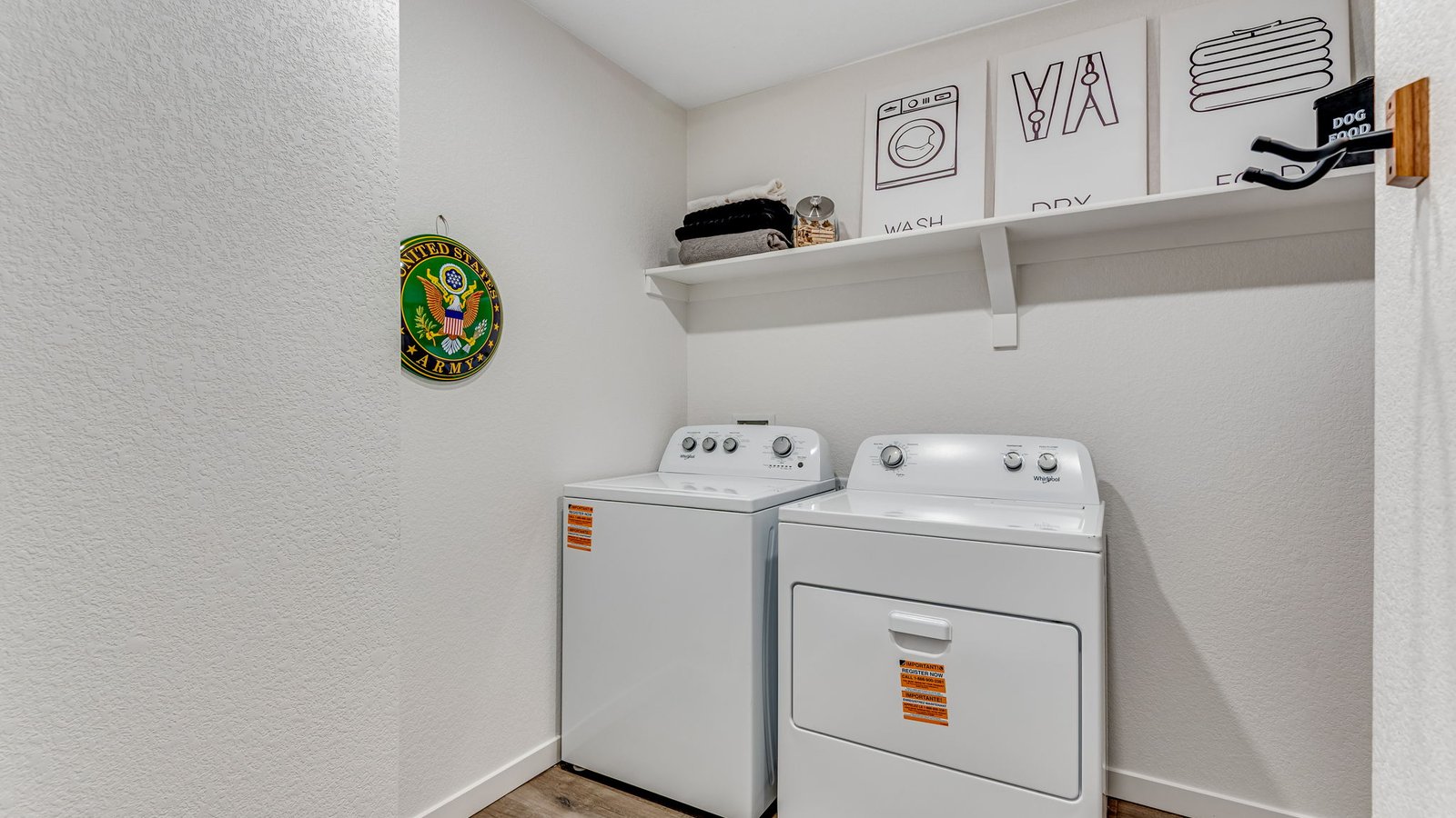 laundry room with storage in D.R. Horton new construction home near brighton colorado