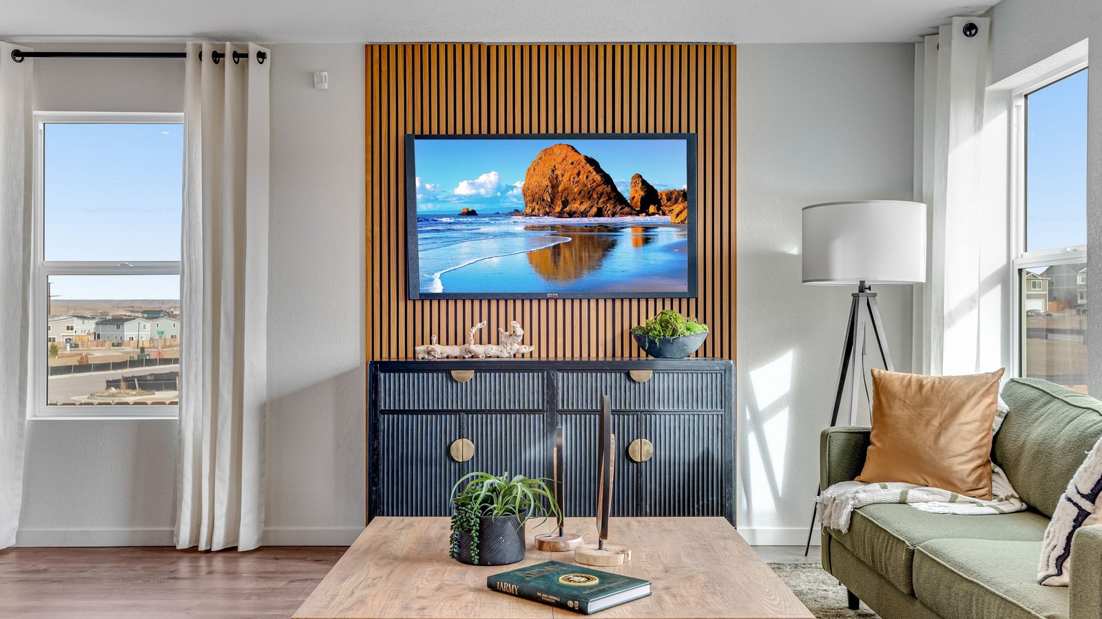 Spacious great room in the Edmon home featuring modern finishes and an open layout for everyday living.