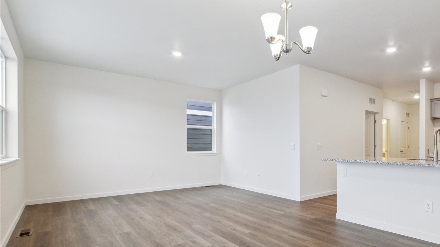 Open concept layout of great room in new home at Silver Peaks Community