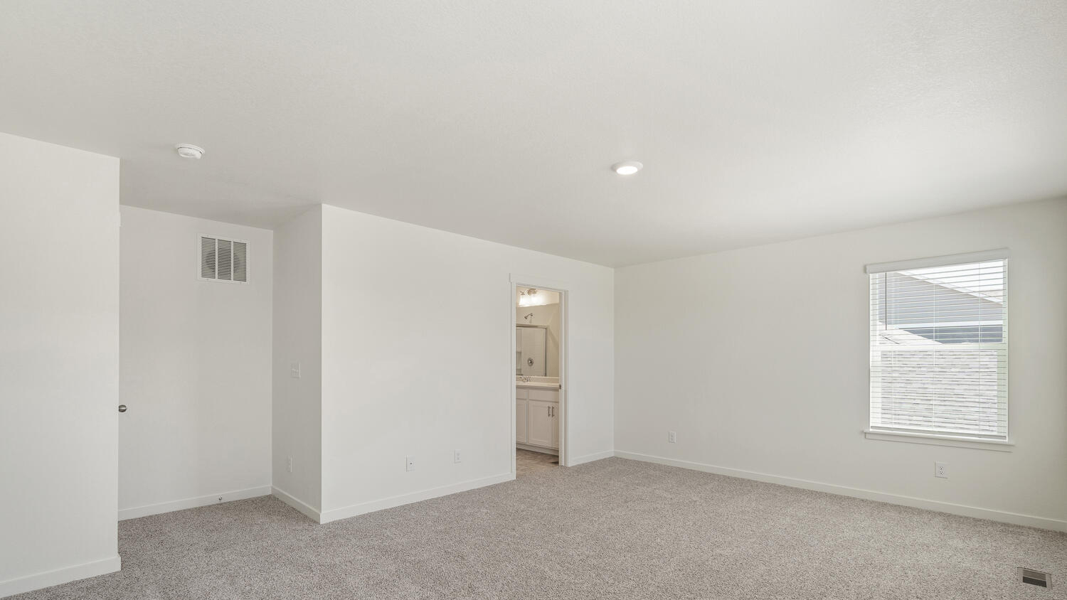 new home with large primary bedroom
