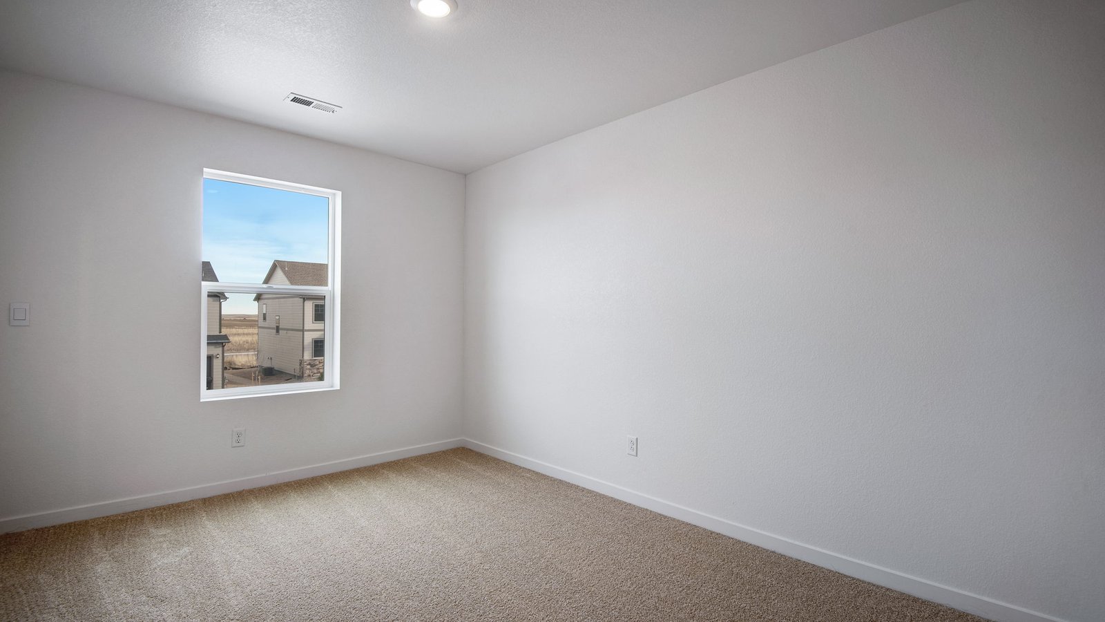 Secondary bedroom in new home near Brighton, Colorado