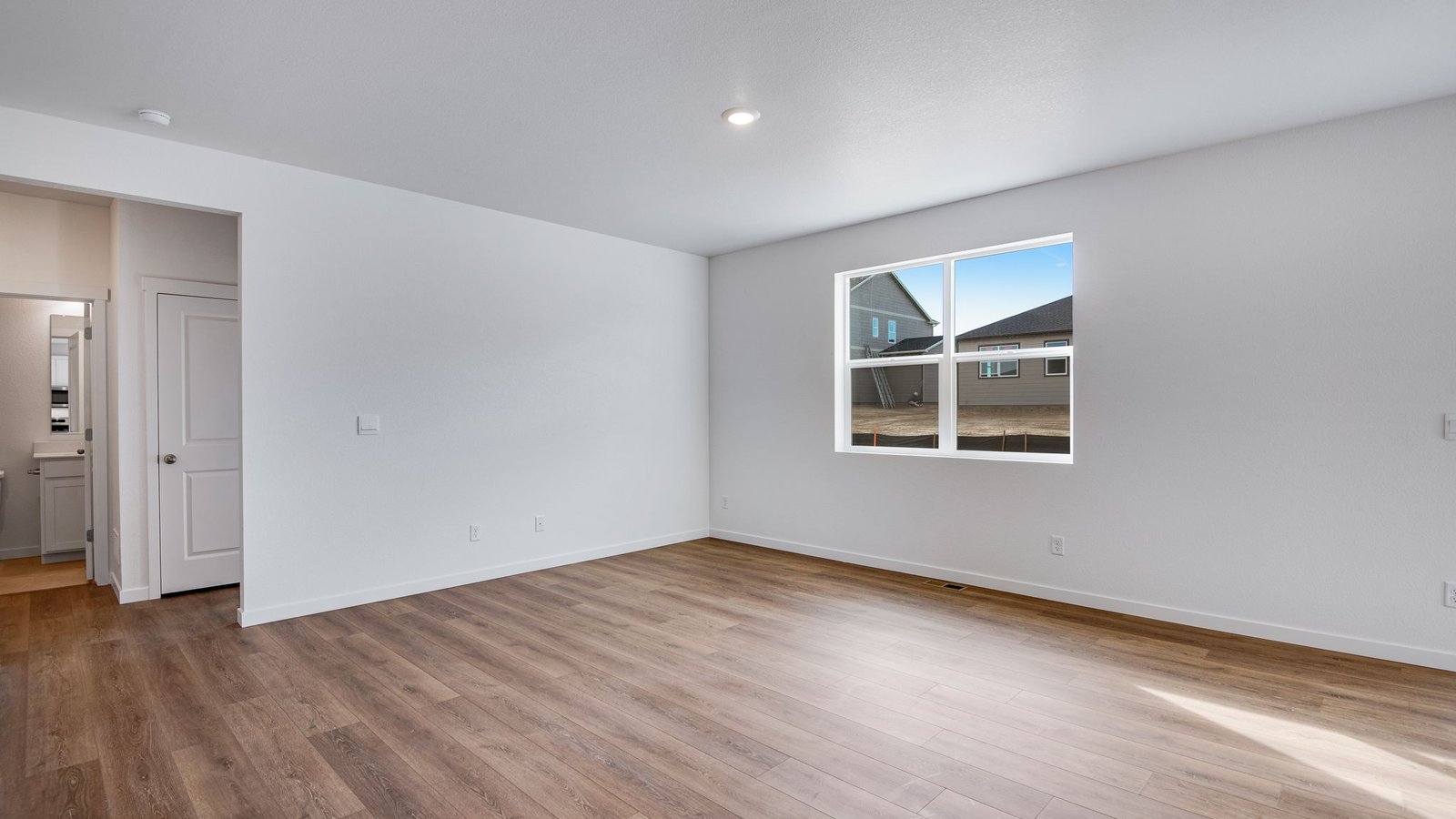 Open concept living room in Lochbuie, Colorado new home