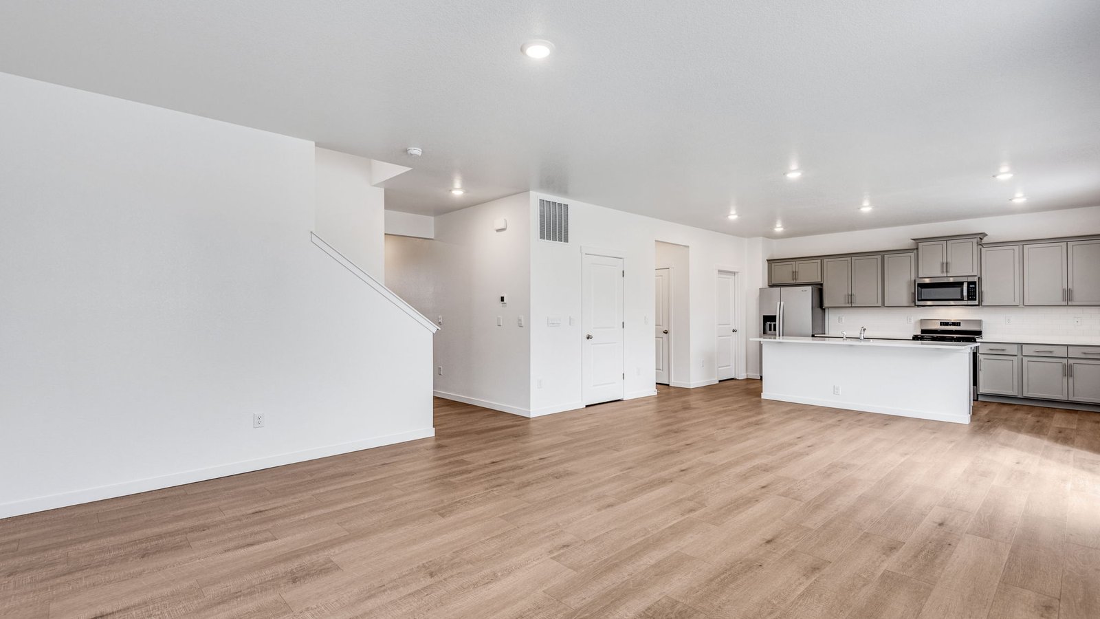 Open concept living in new Lochbuie Home