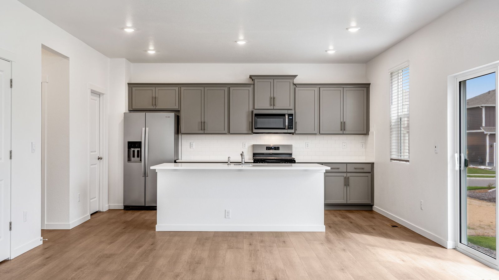 Spacious kitchen with new finishes in new home at Silver Peaks Community