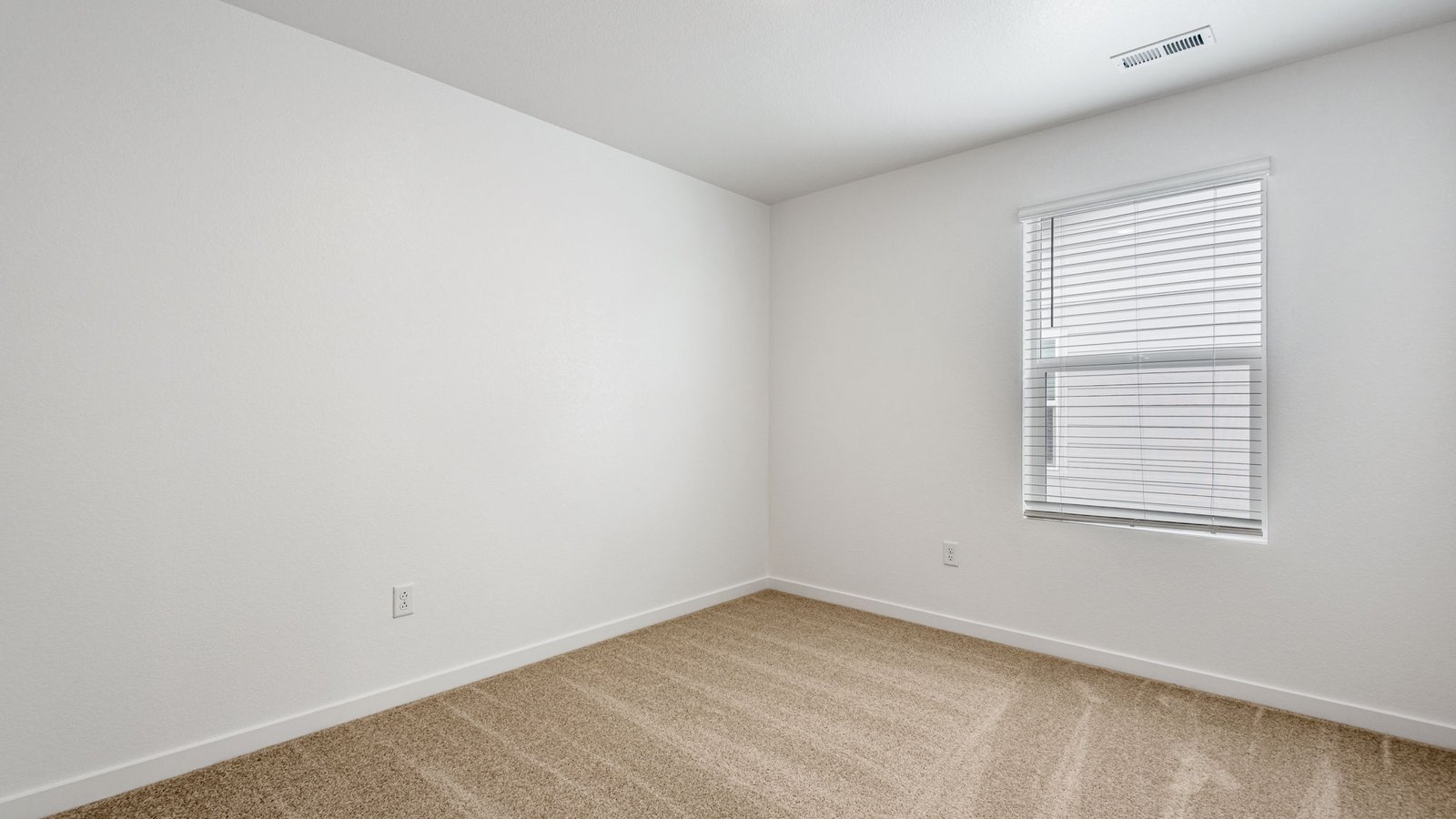 Secondary bedroom in new home at Silver Peaks Community in Lochbuie Colorado