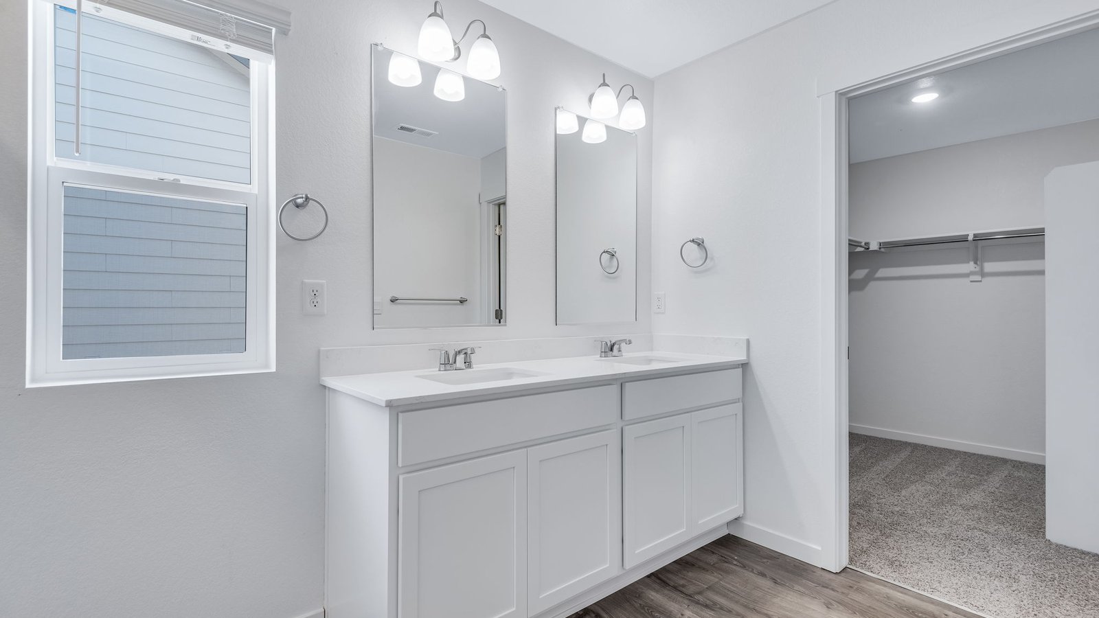 primary bath with walk-in closet
