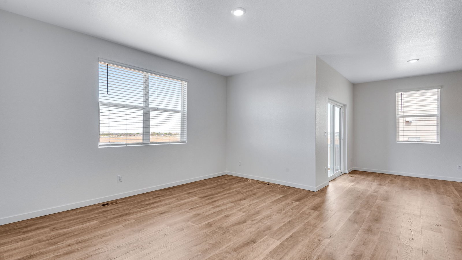 Dining nook in the Chatham floor plan with easy access to the covered patio through sliding glass doors.