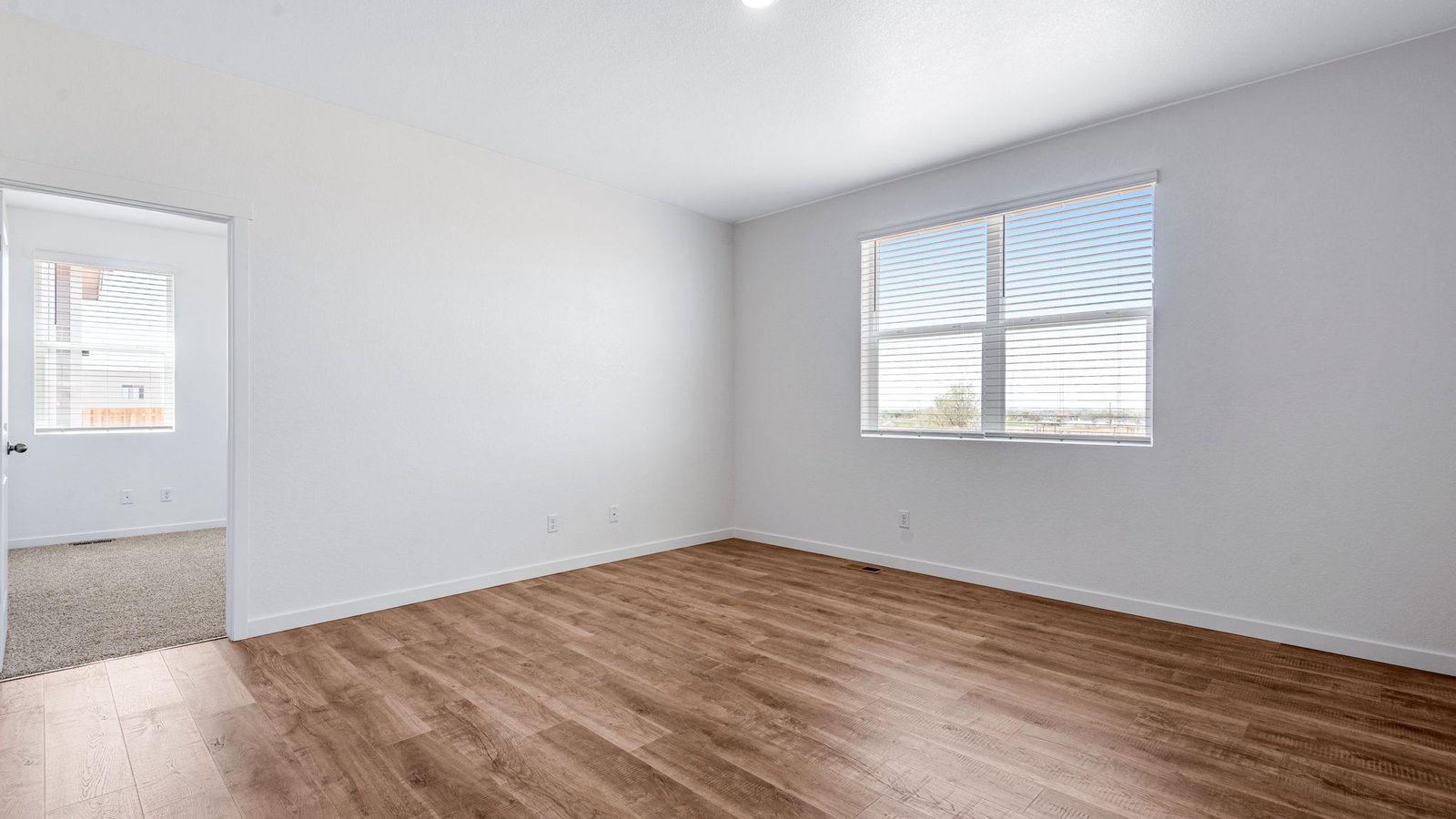 Comfortable living room in the Chatham home with an inviting layout for relaxing and entertaining.
