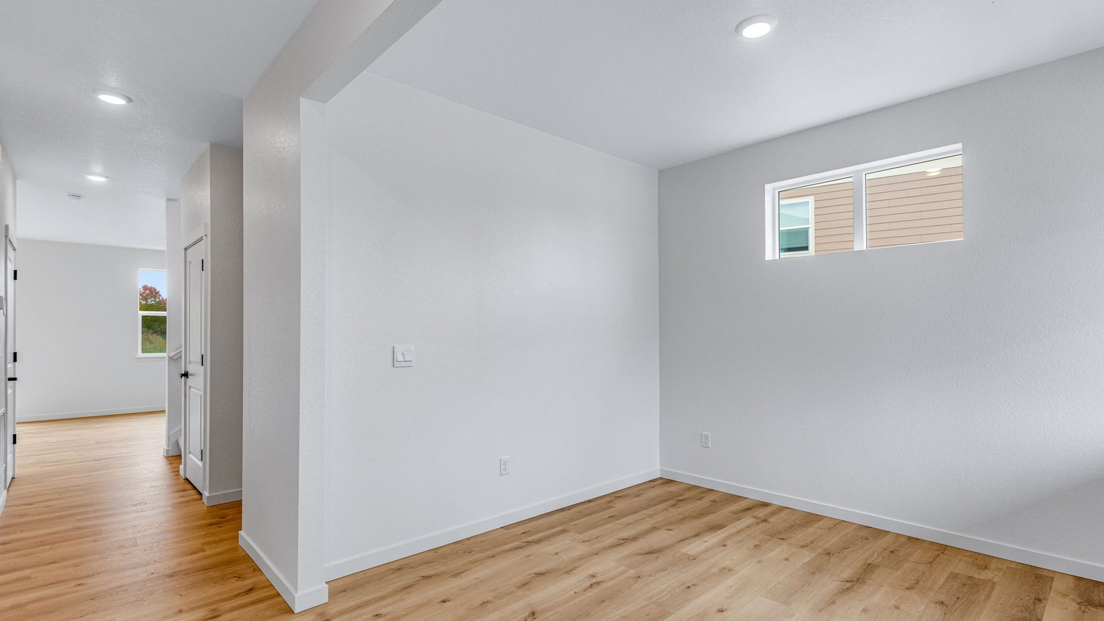 front entry and hallway of new construction home in windsor, co