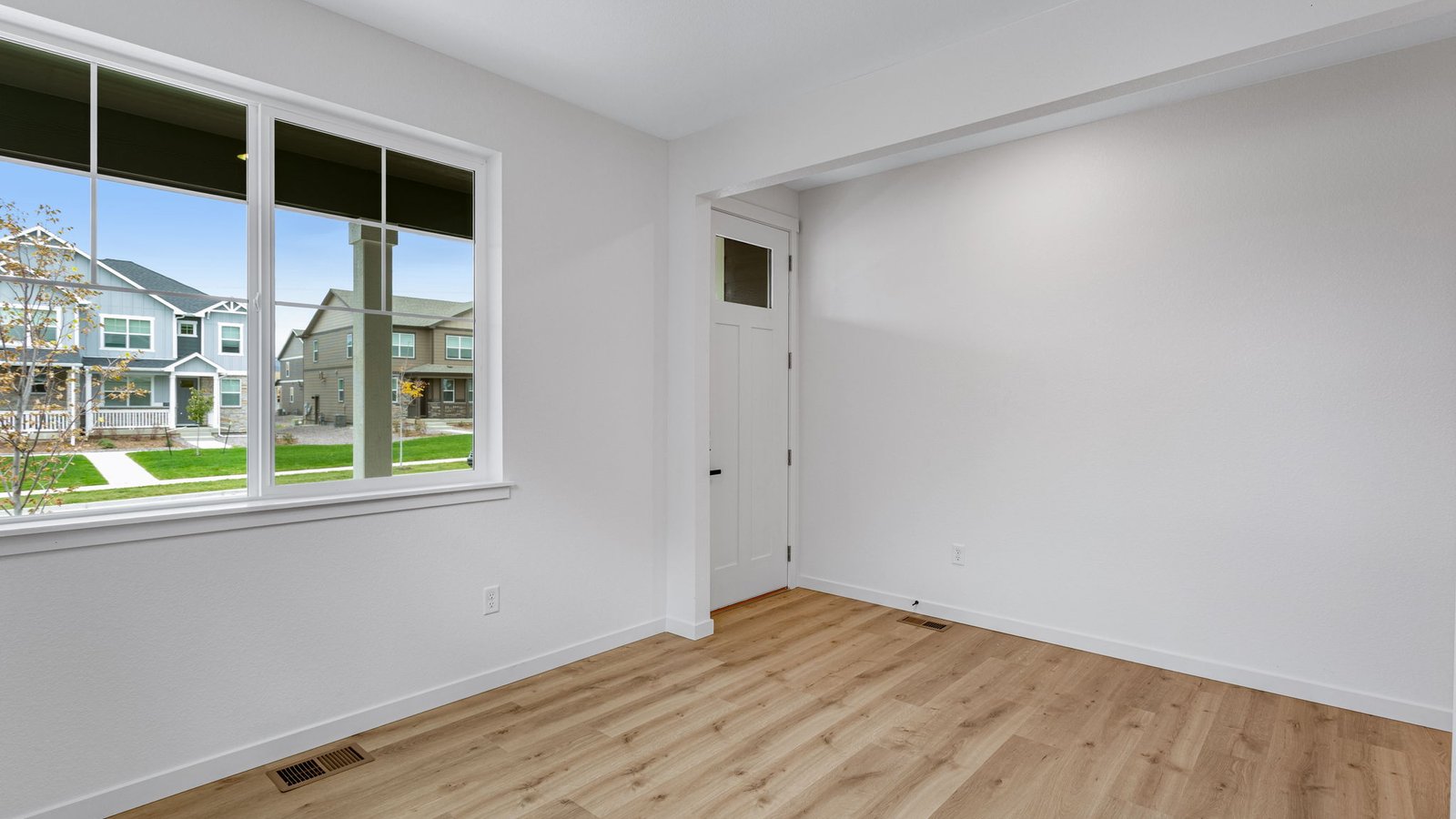 flex room with large window in new windsor colorado home