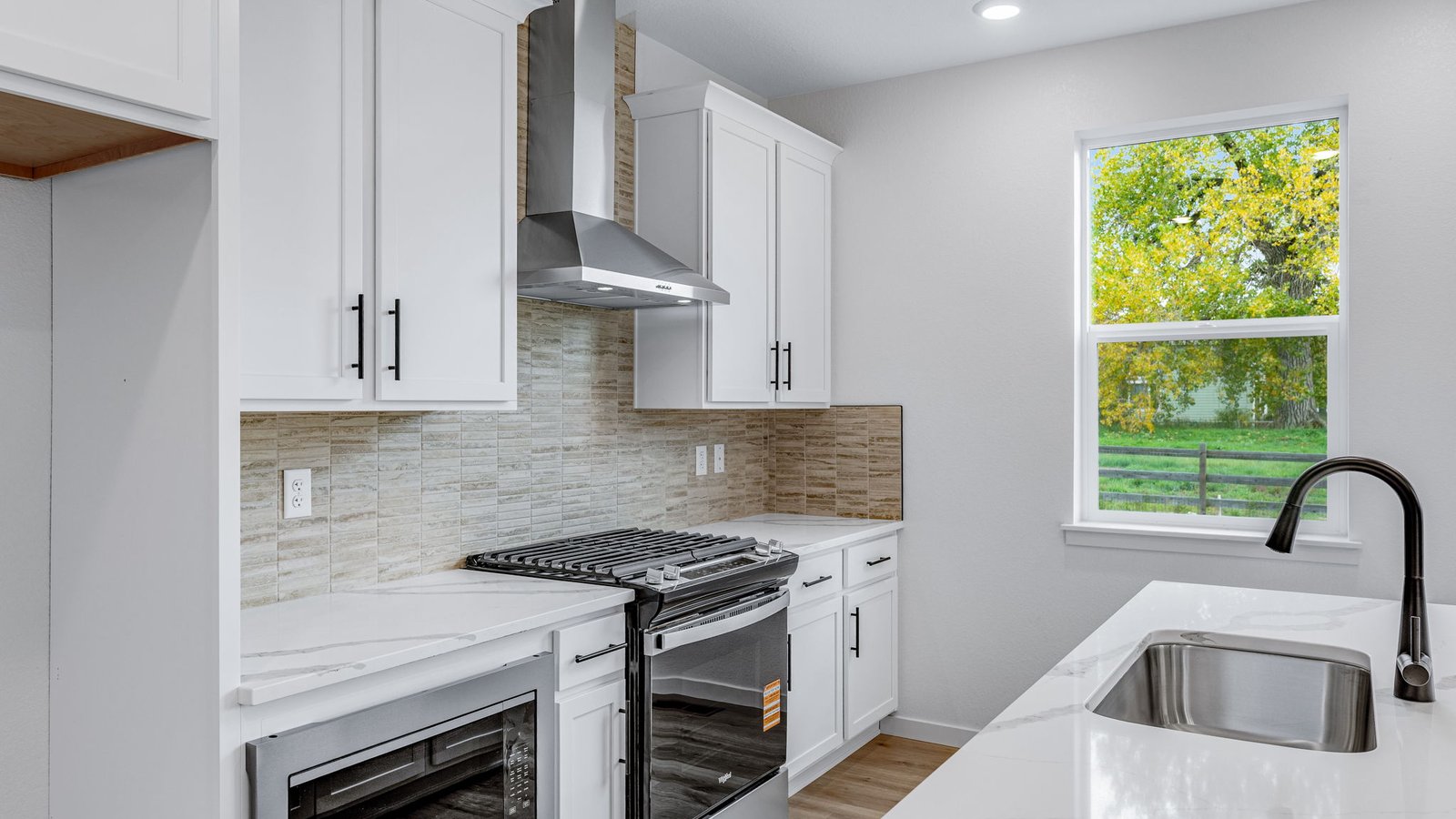 kitchen island and back cabinets in new windsor, co new construction home