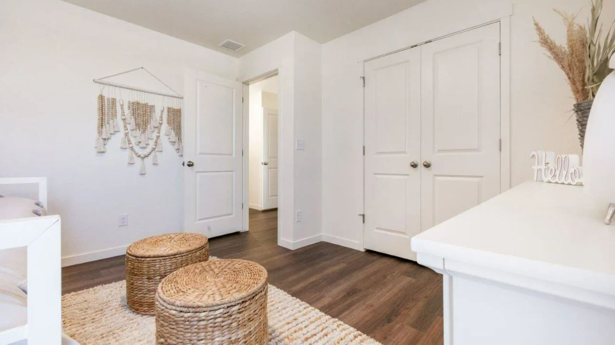 guest bedroom in new construction home in Windsor, CO