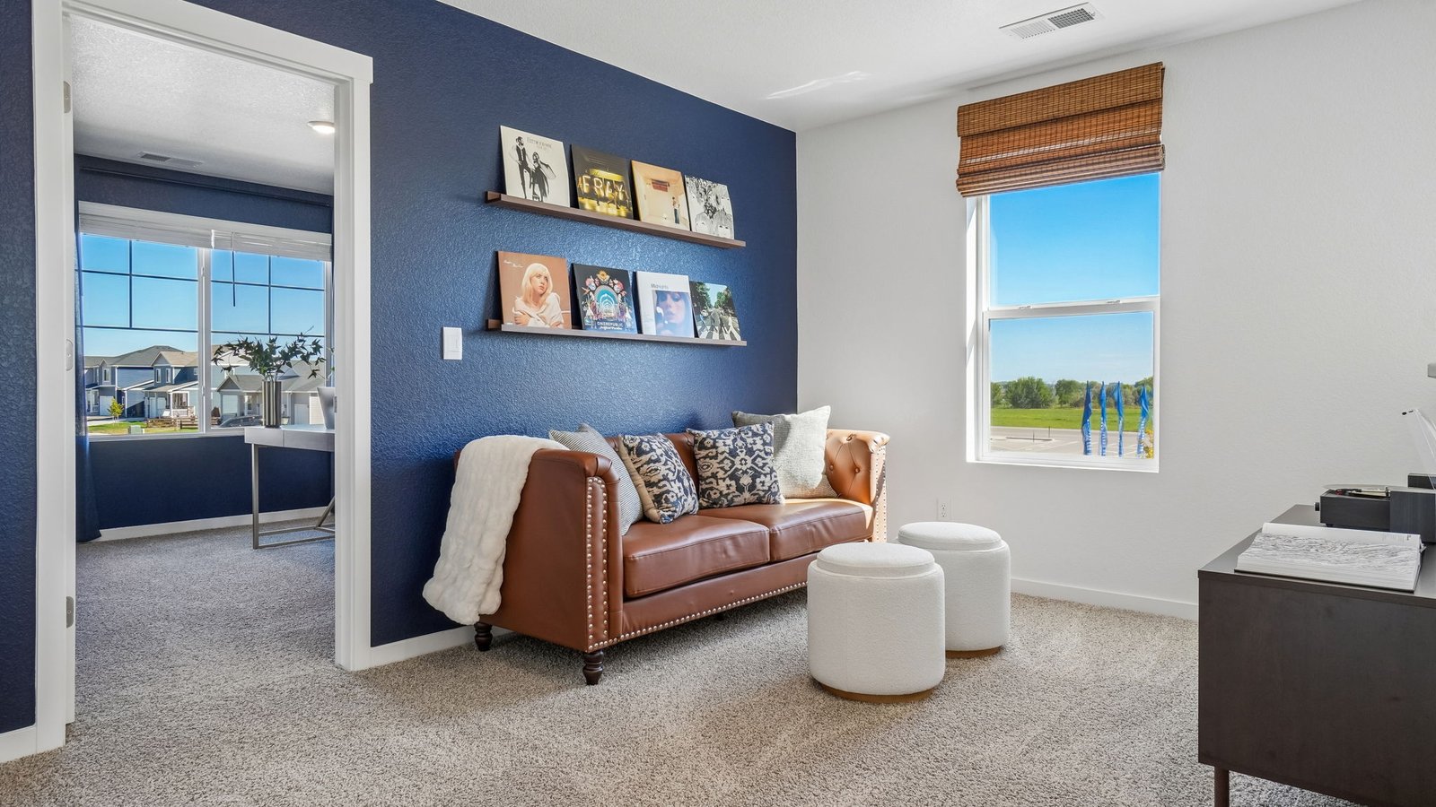 Versatile loft space ideal for a media room, playroom, or secondary living area.