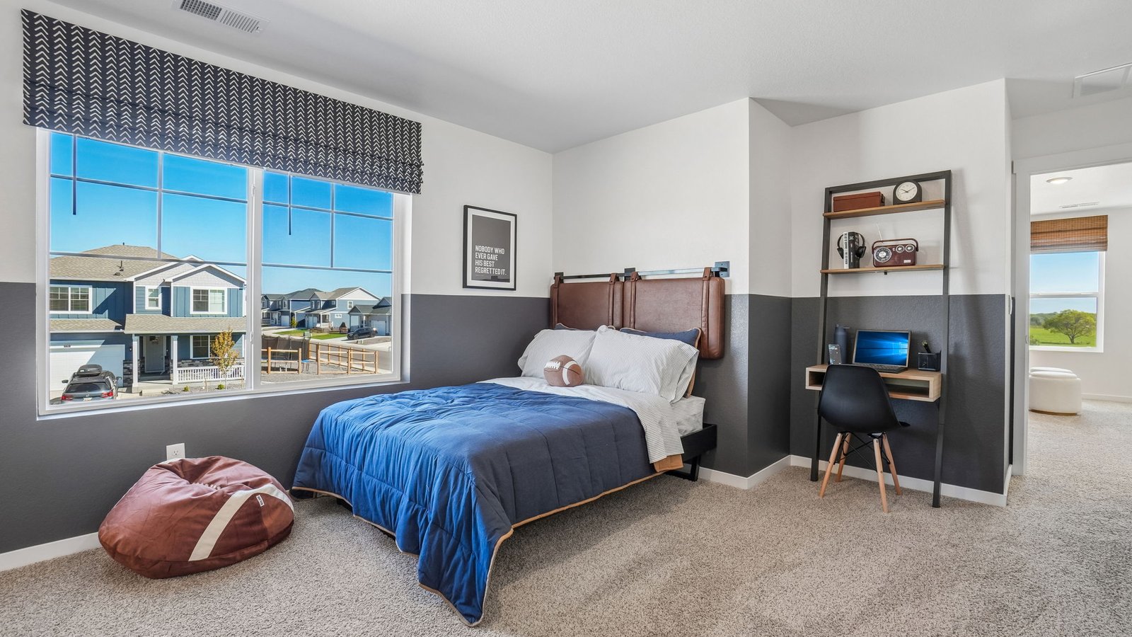Comfortable guest bedroom with modern finishes and versatile functionality.