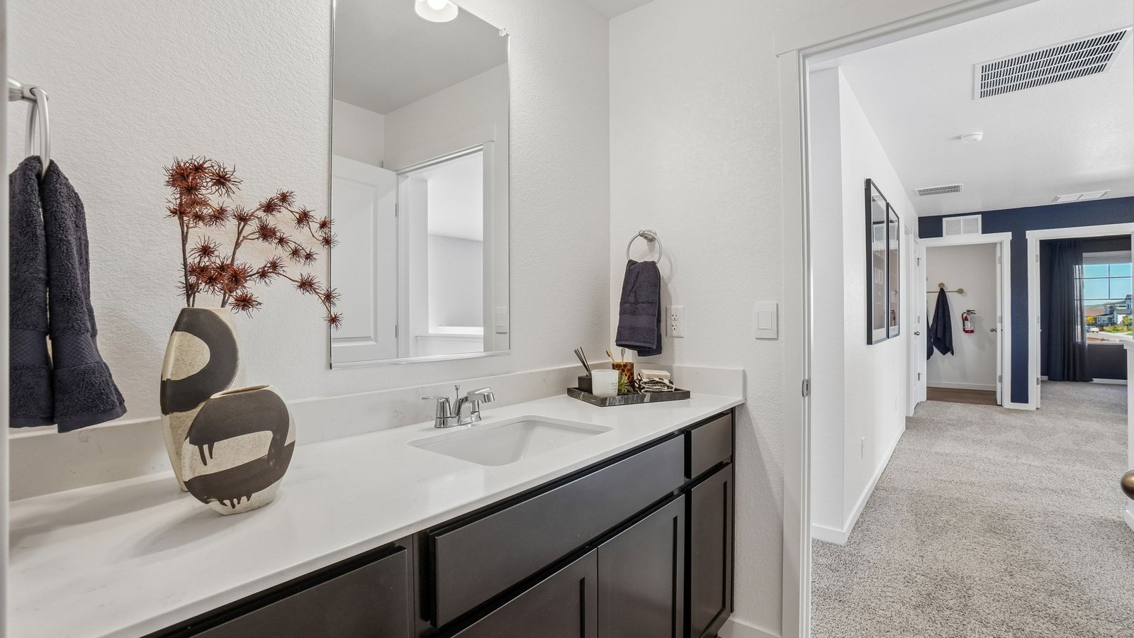 Stylish full bathroom featuring modern design and functional layout.