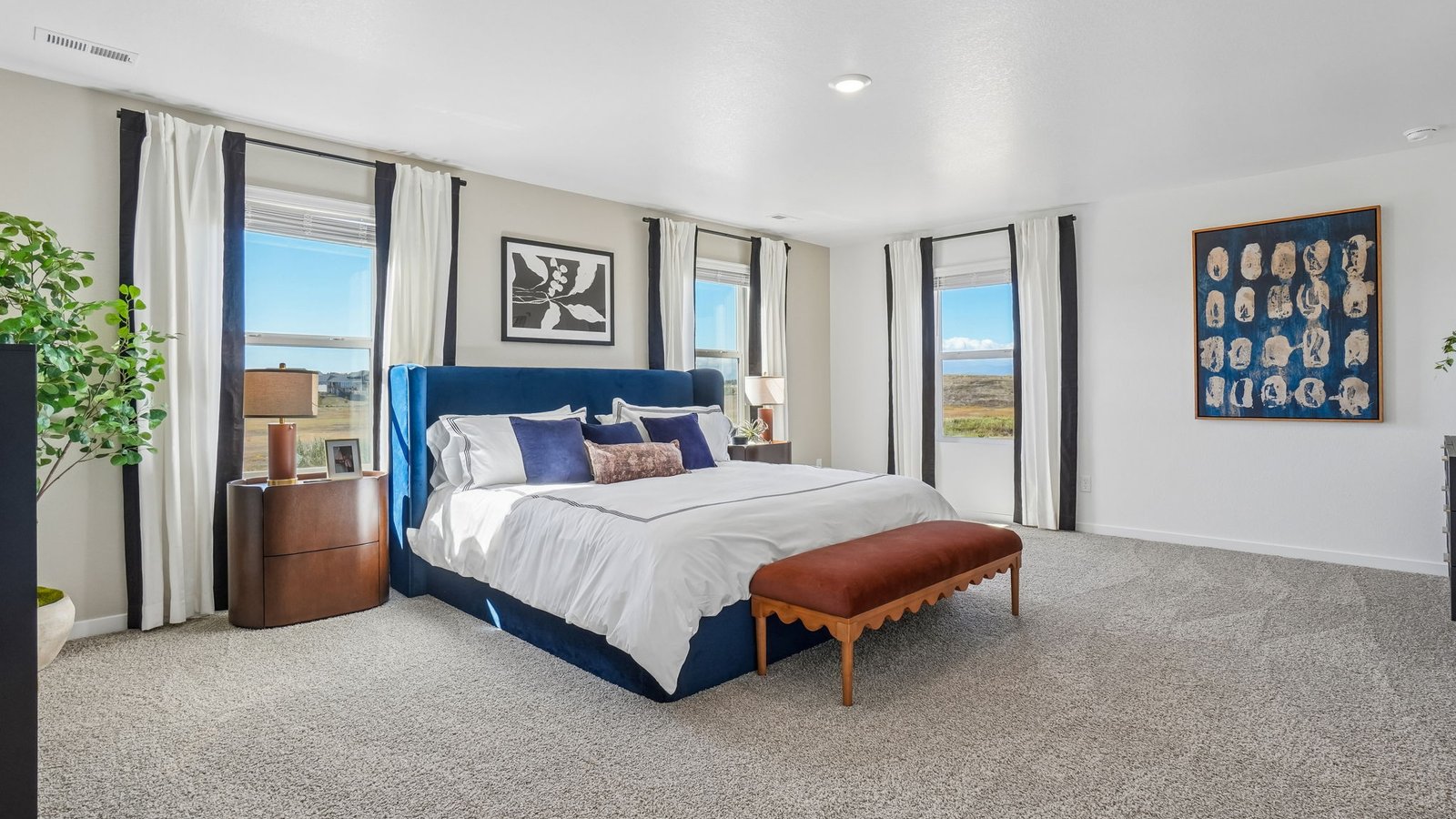 Oversized primary bedroom designed for comfort and everyday relaxation.