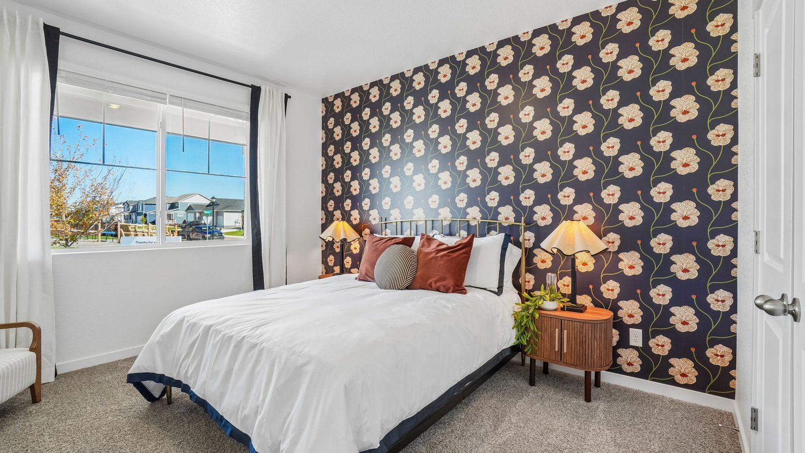Convenient main-level bedroom perfect for guests, multigenerational living, or a home office.