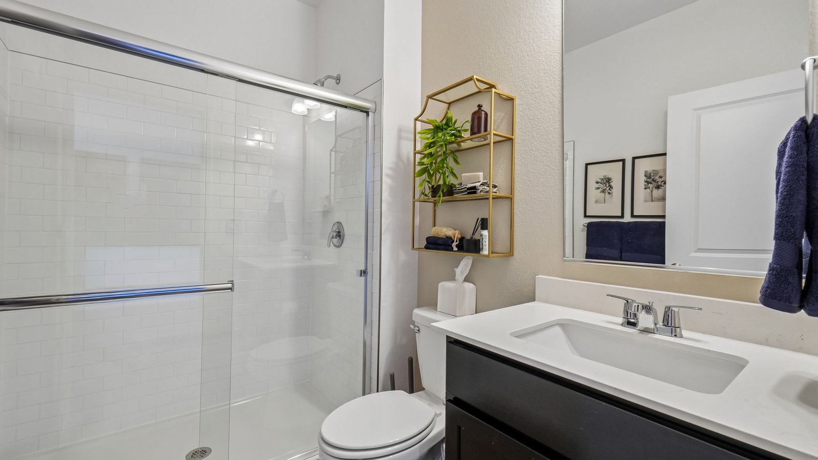 Main-level full bathroom featuring modern fixtures and stylish finishes.