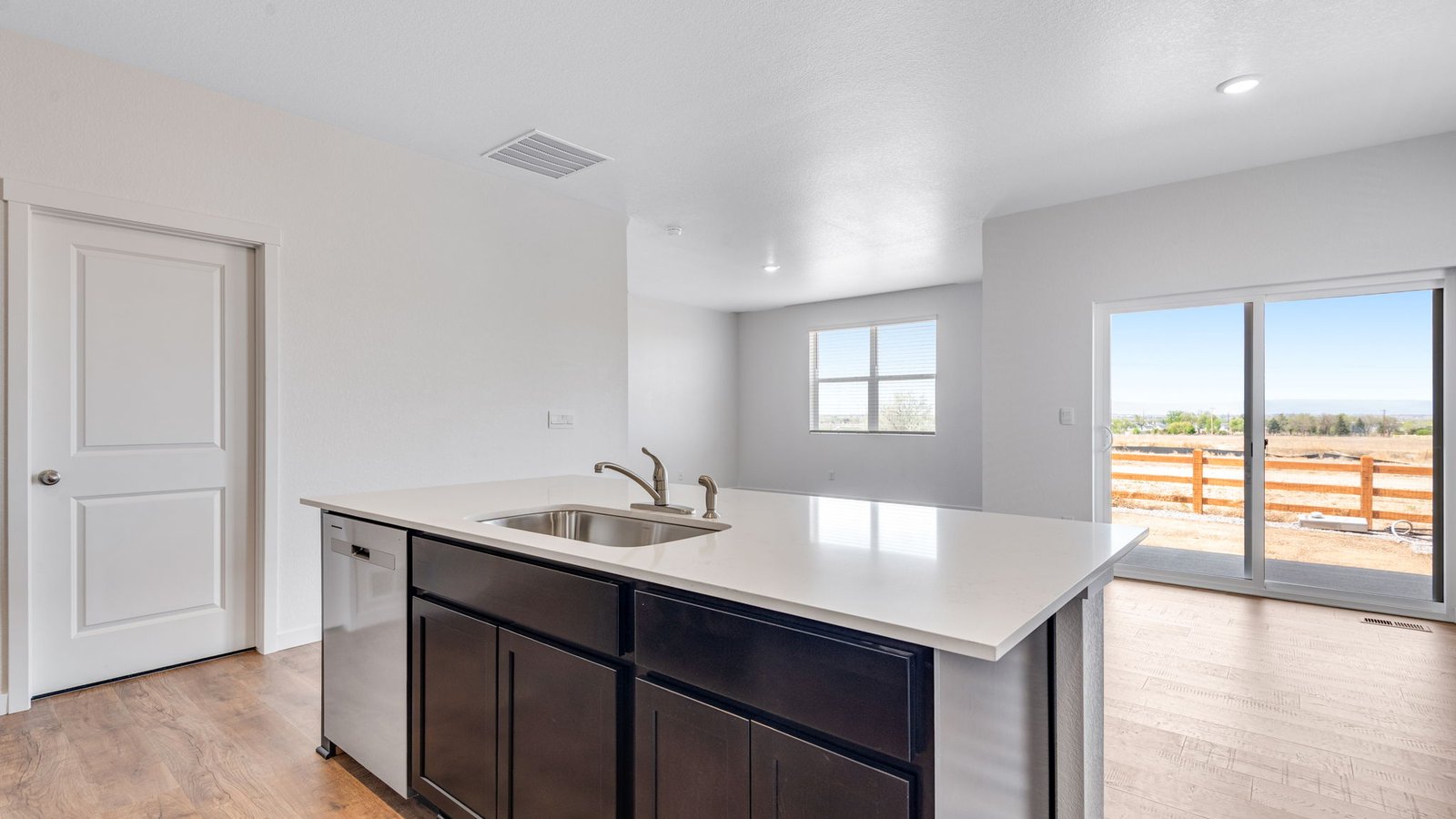 Kitchen island with great views in new home in Lakeside Canyon community