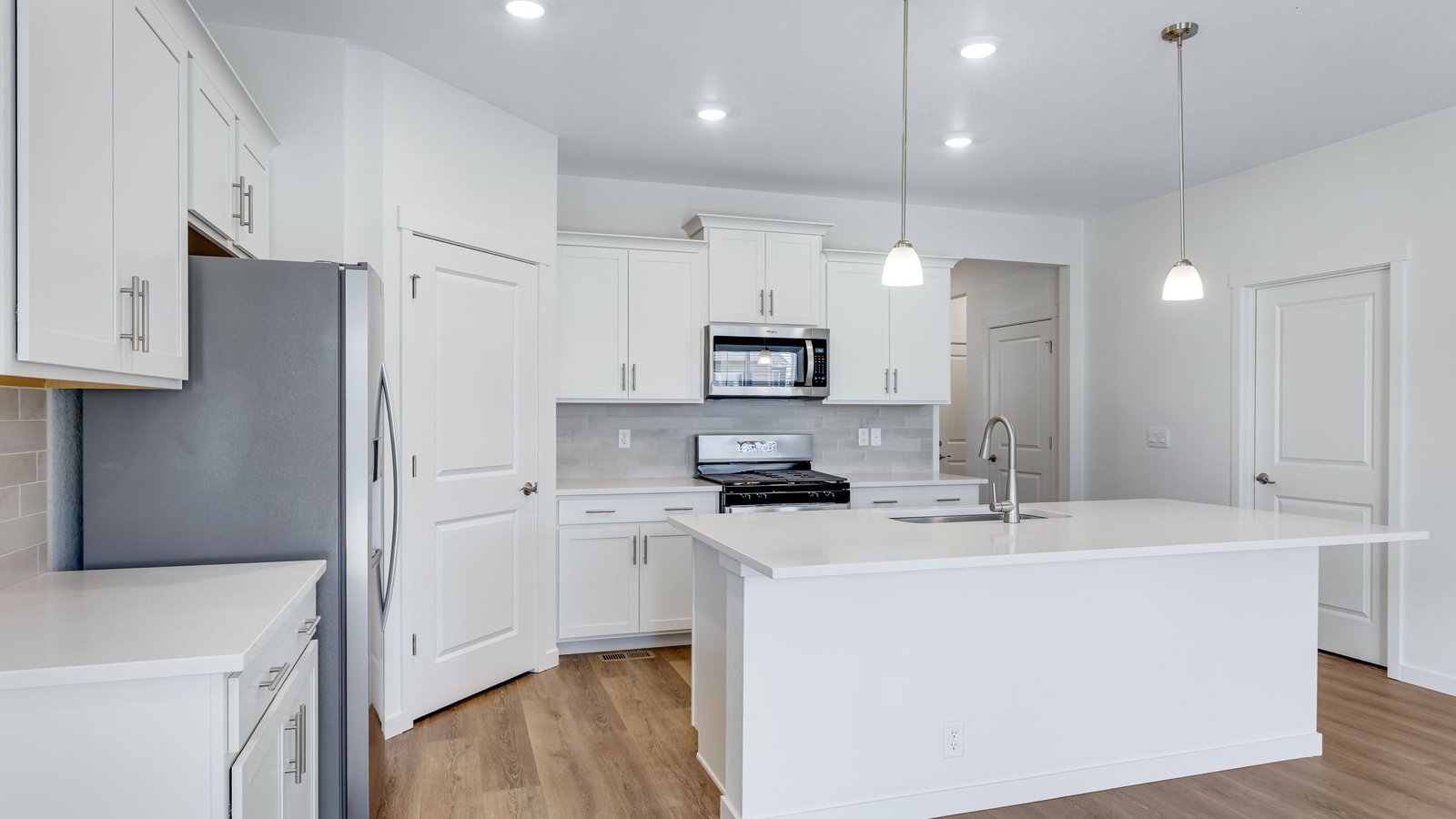 kitchen with white cabinets