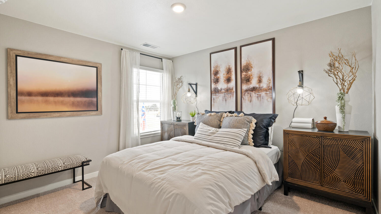 Secondary bedroom with spacious closets in Bellamy floorplan of new home in Mead, Colorado