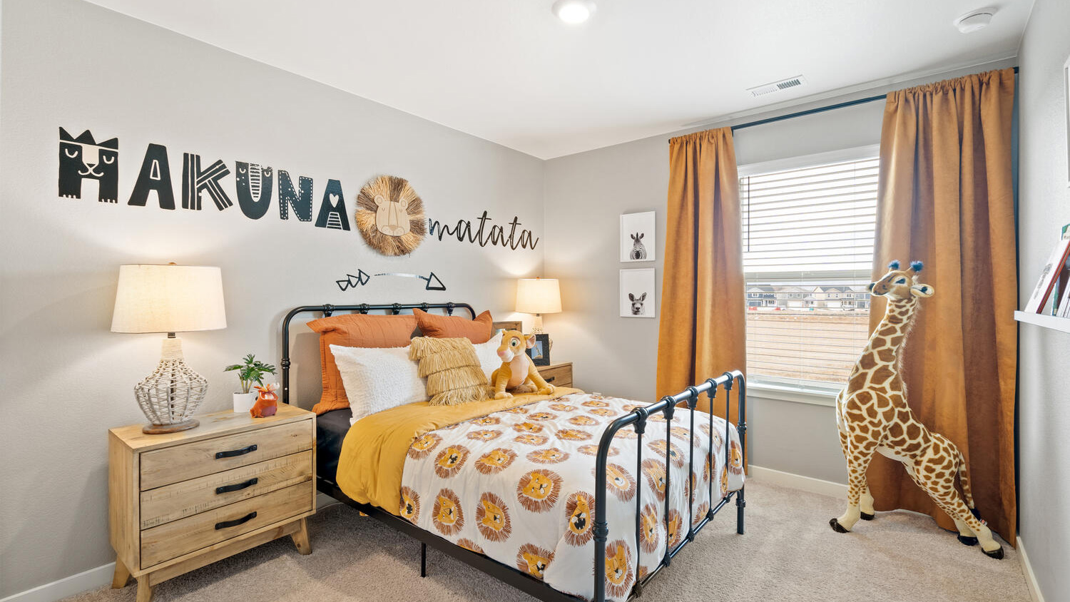 Secondary bedroom with large windows in new D.R. Horton Lakeside Canyon community