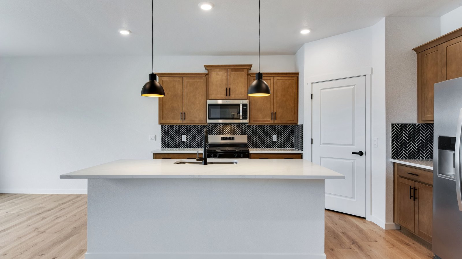 Spacious kitchen with new timber package at Henley new home